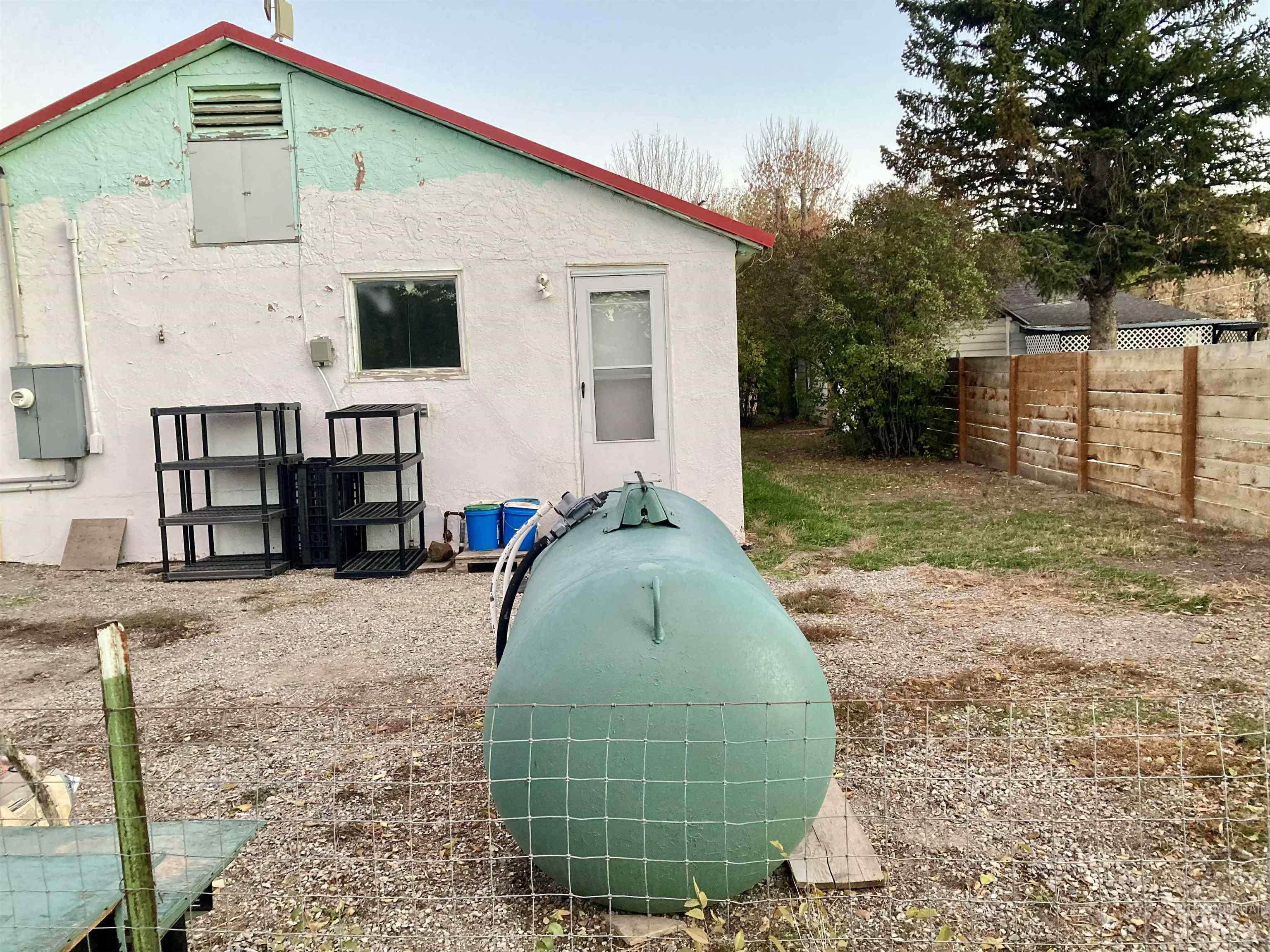 Rear view of property featuring stucco siding