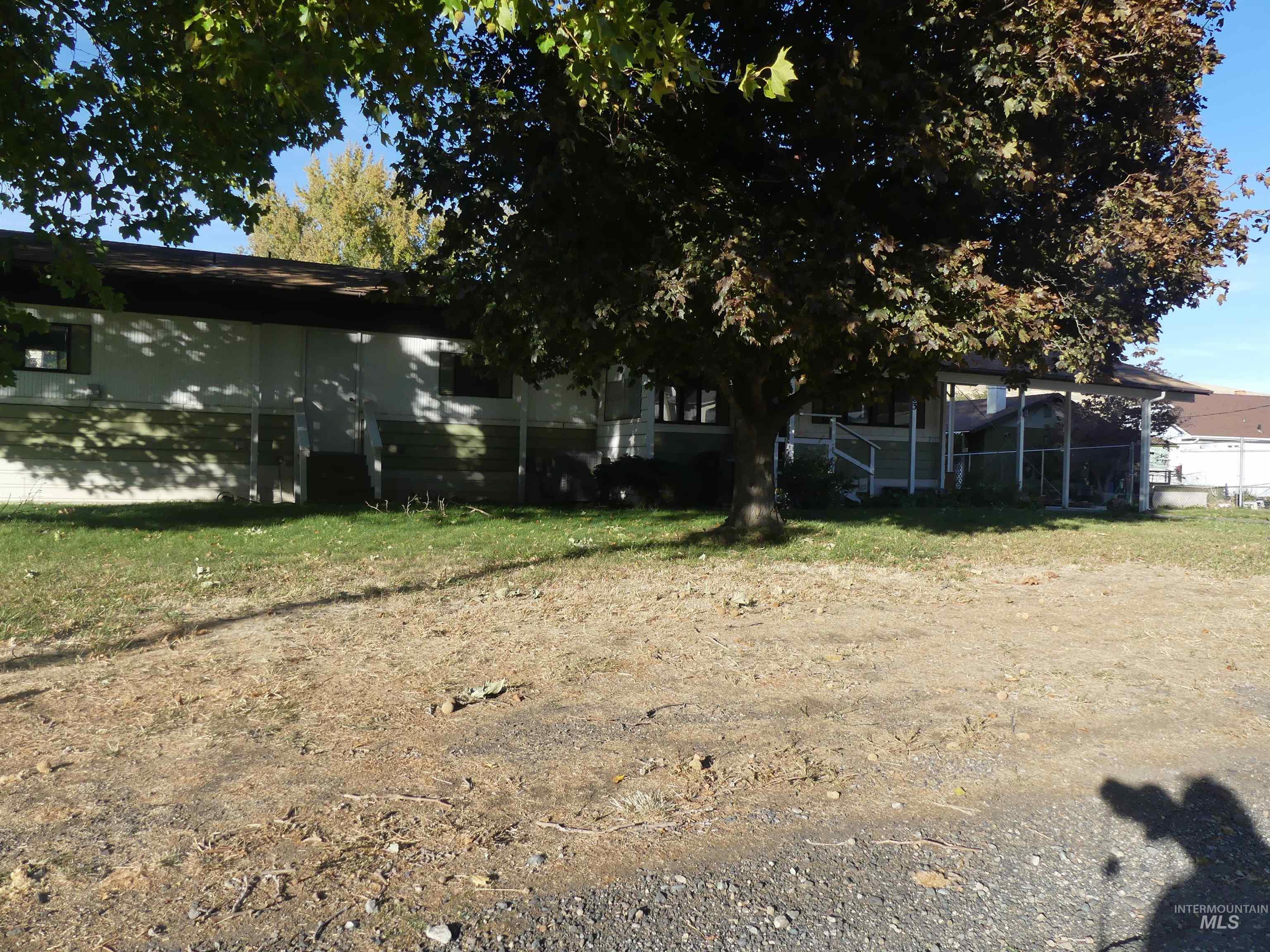 View of yard featuring a sunroom