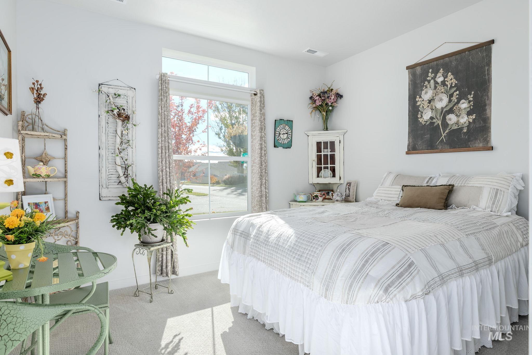 Bedroom with carpet and baseboards