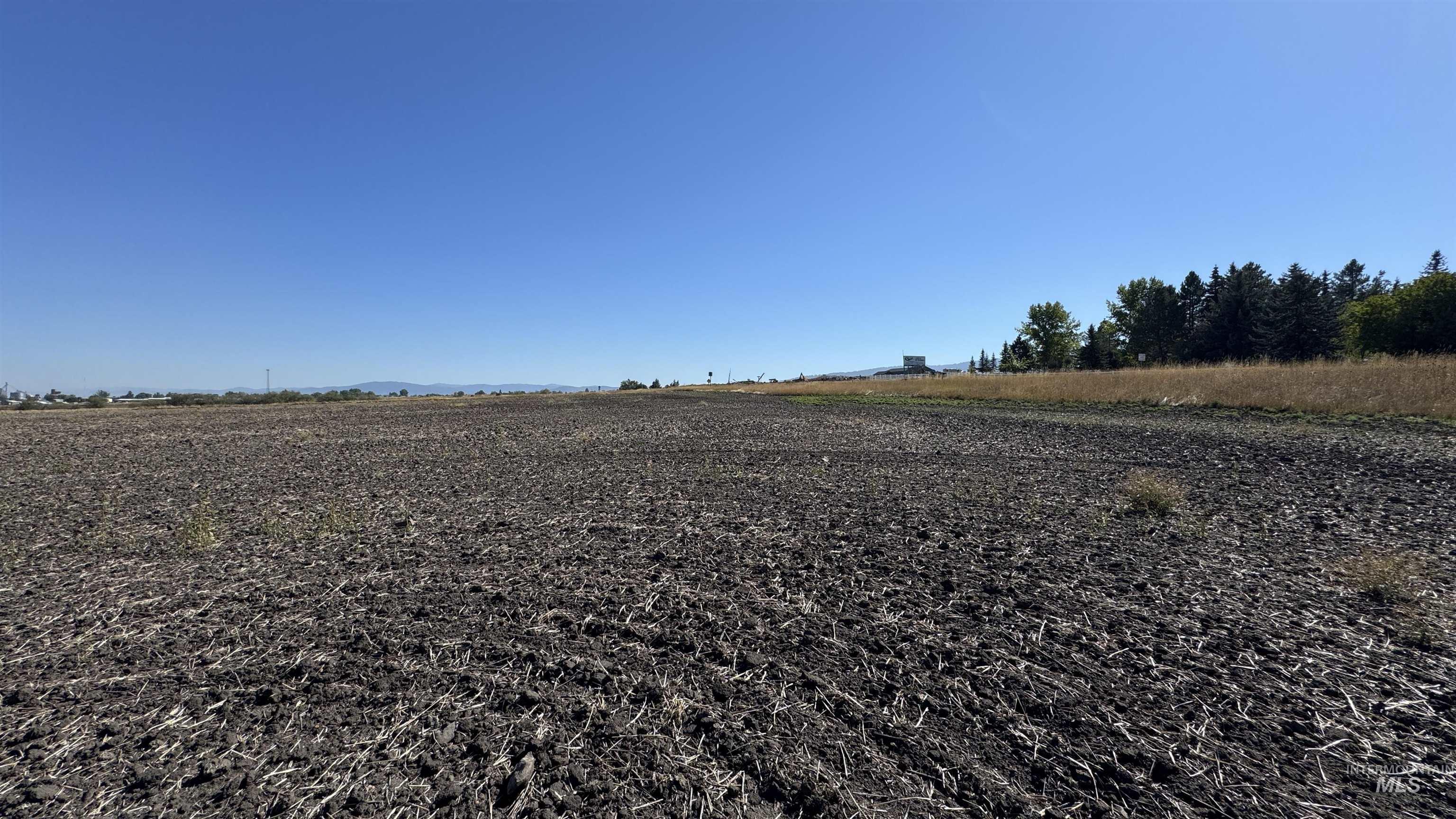 View of yard with a view of countryside