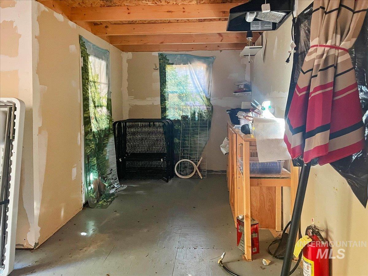 Miscellaneous room featuring beamed ceiling