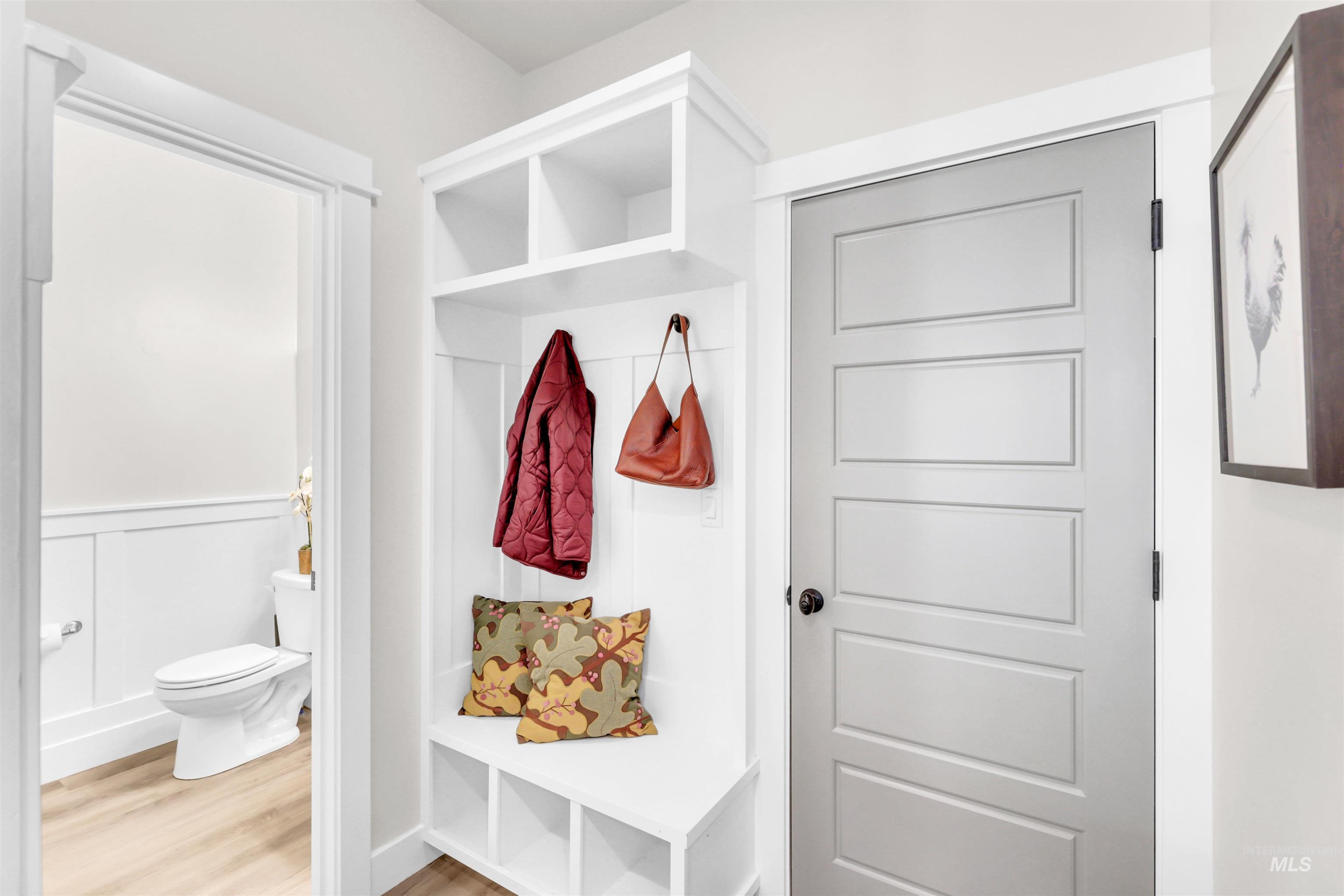 Mudroom featuring wood finished floors