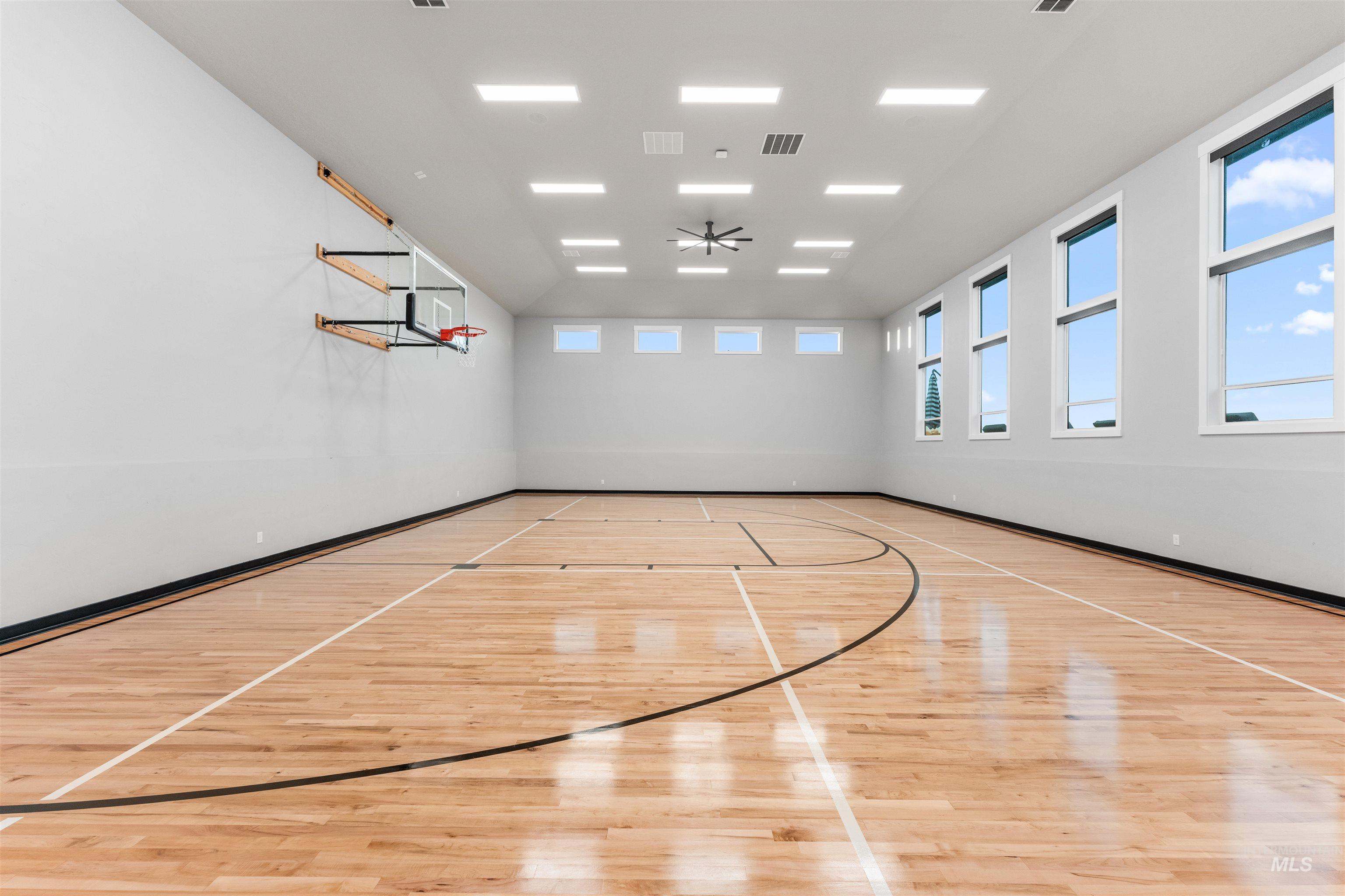 View of sport court featuring community basketball court
