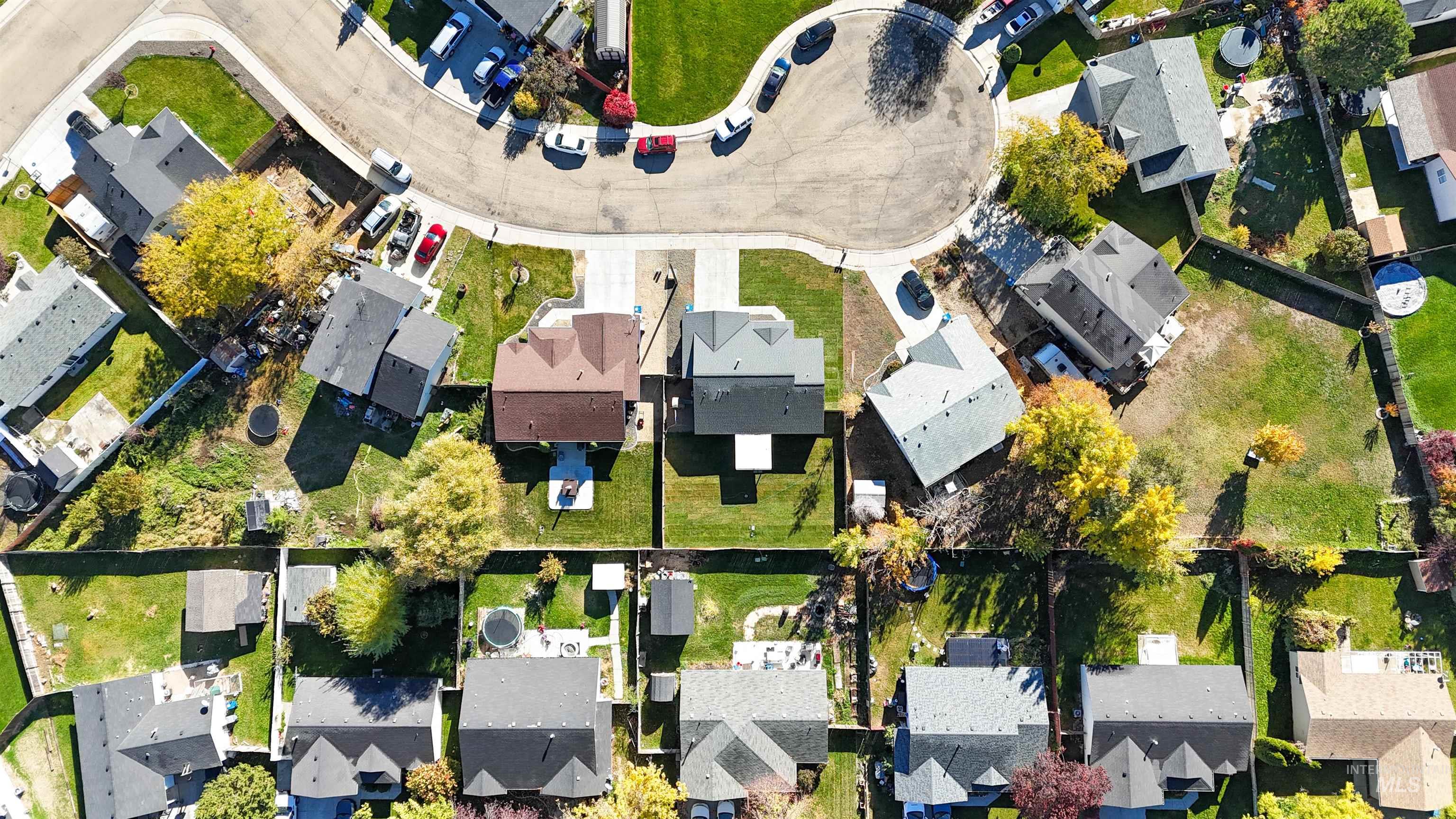 Aerial view of property's location featuring nearby suburban area