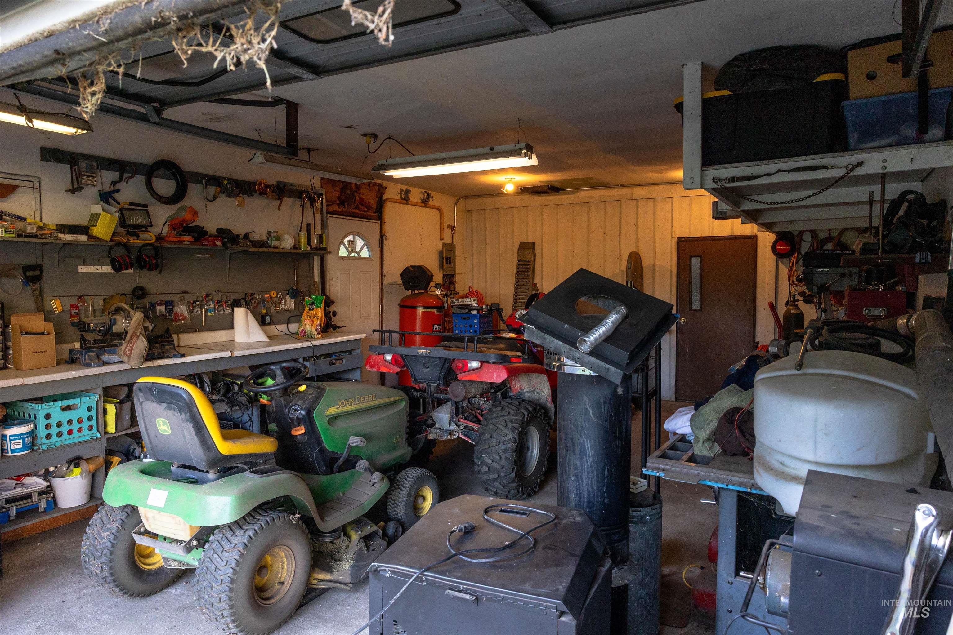 Garage featuring a workshop area