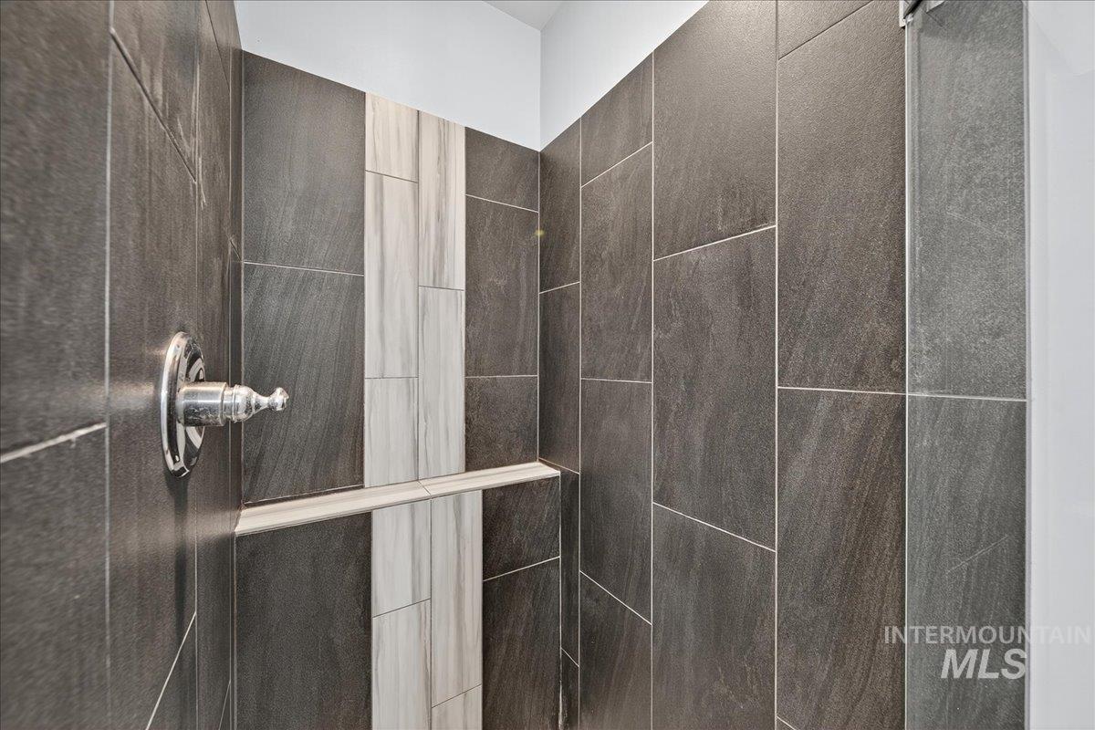 Bathroom view of tiled shower