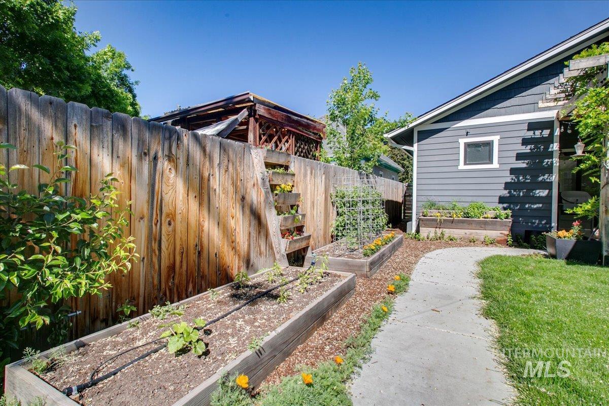 View of yard with a vegetable garden