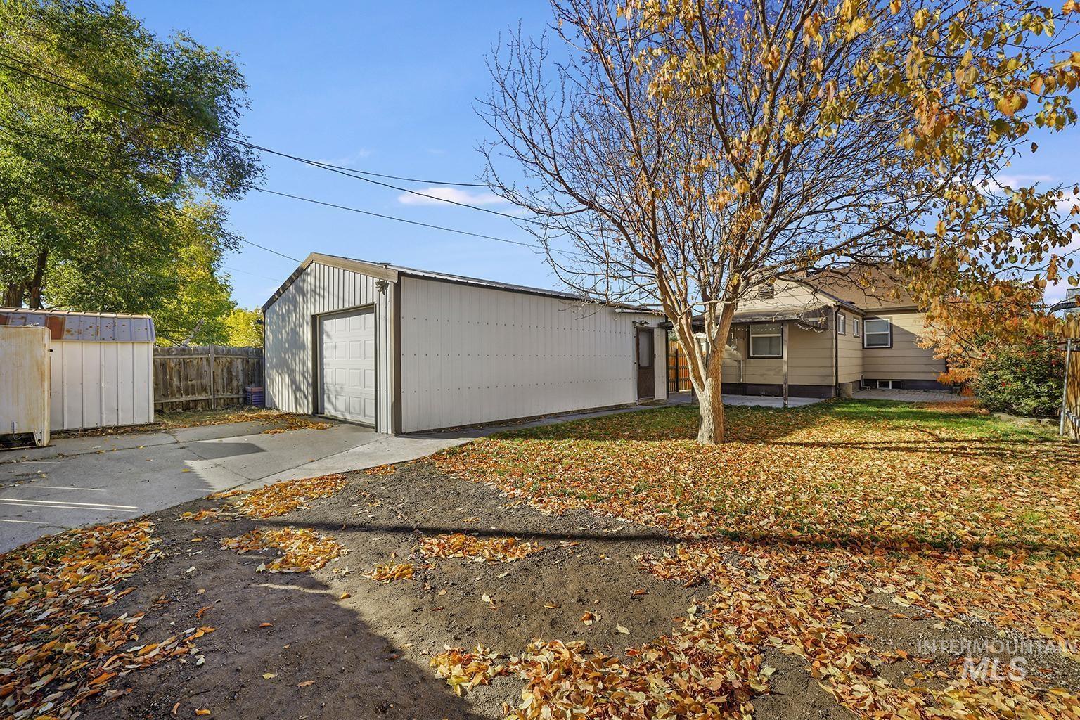 Garage with concrete driveway