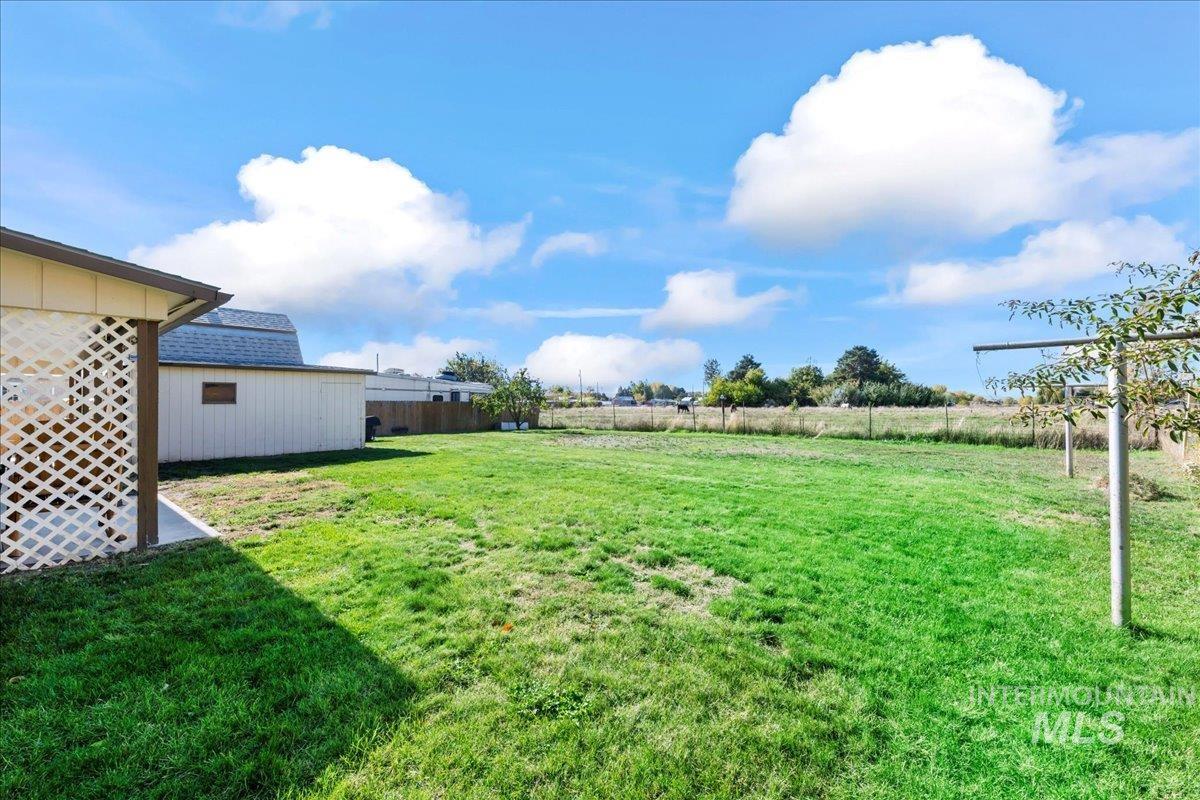 View of fenced backyard