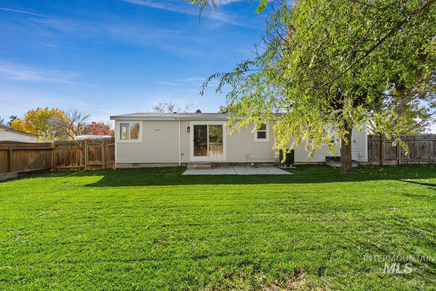 Back of house featuring a patio and a fenced backyard