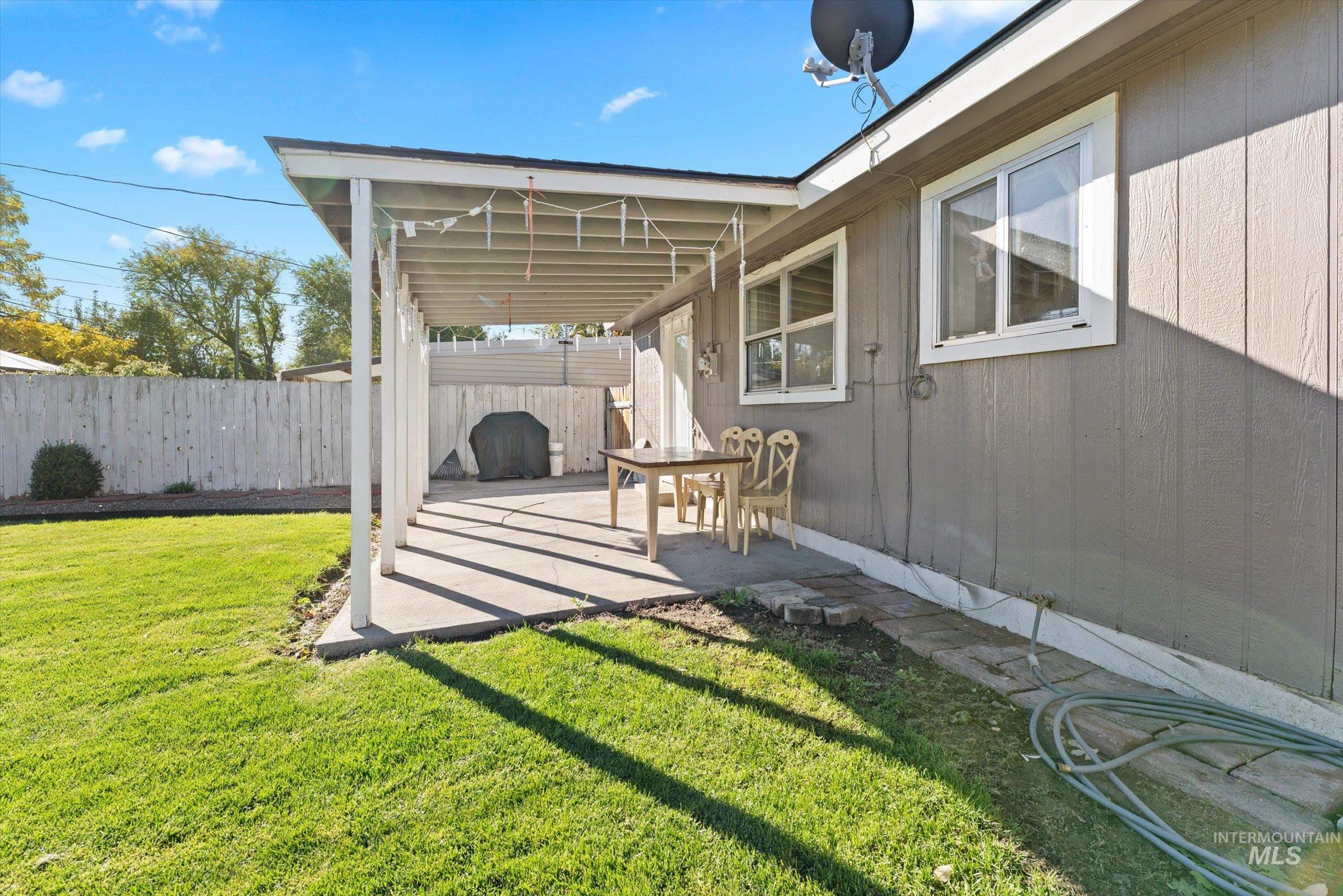 View of yard with a patio area