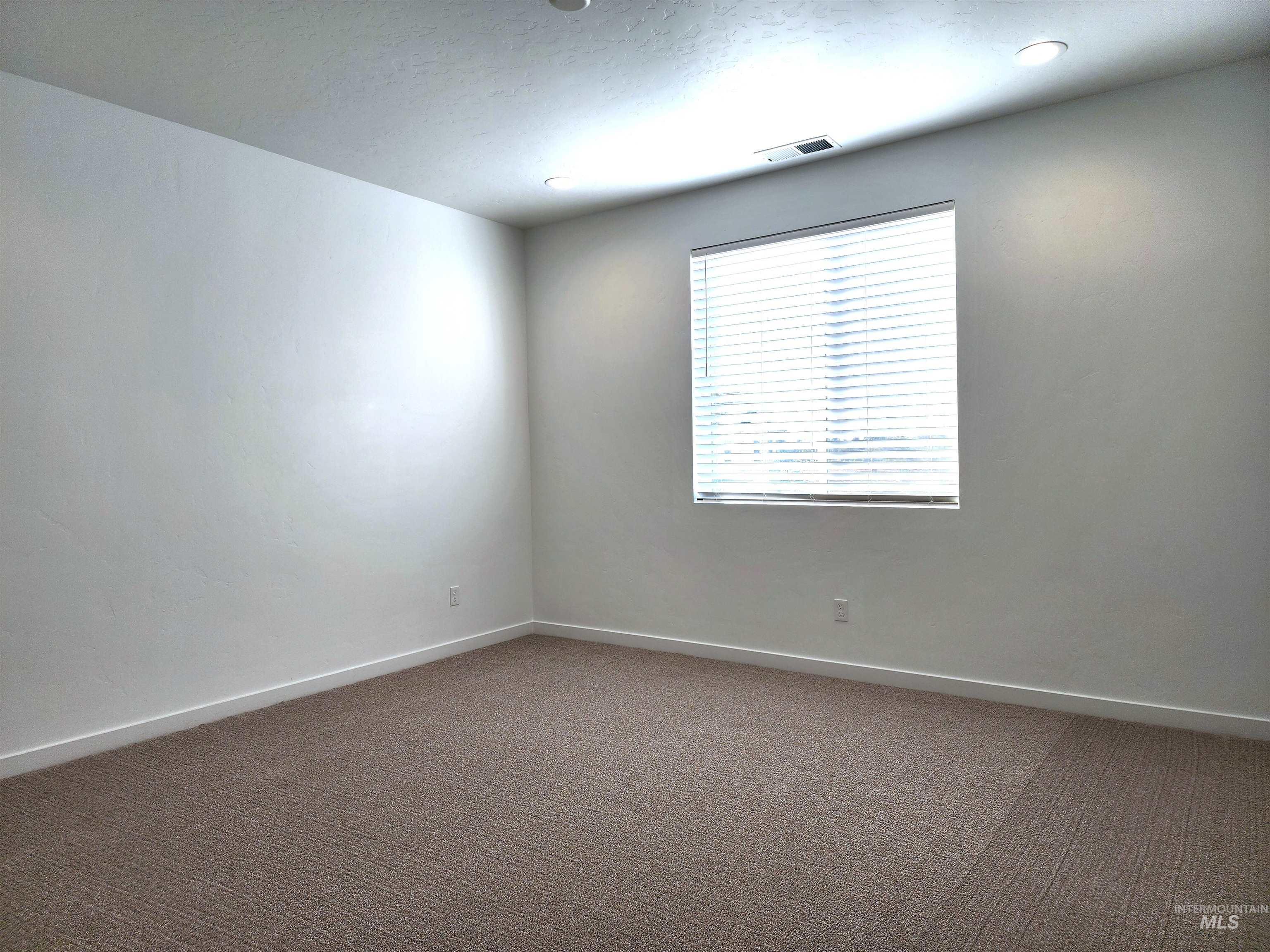 Spare room with carpet