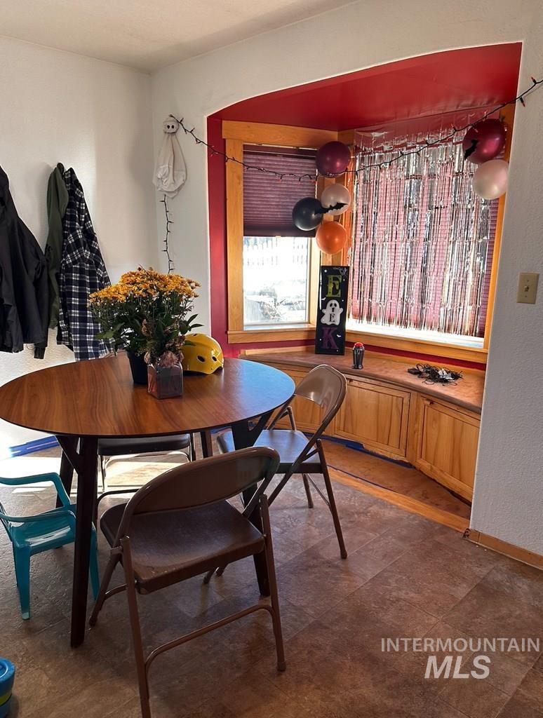 Dining space featuring baseboards