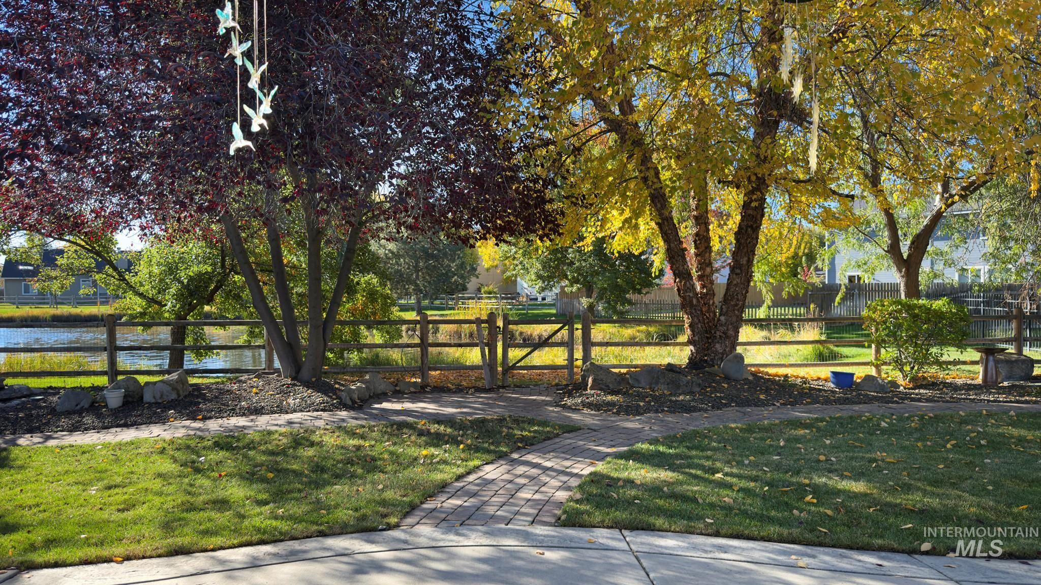 View of home's community with a water view