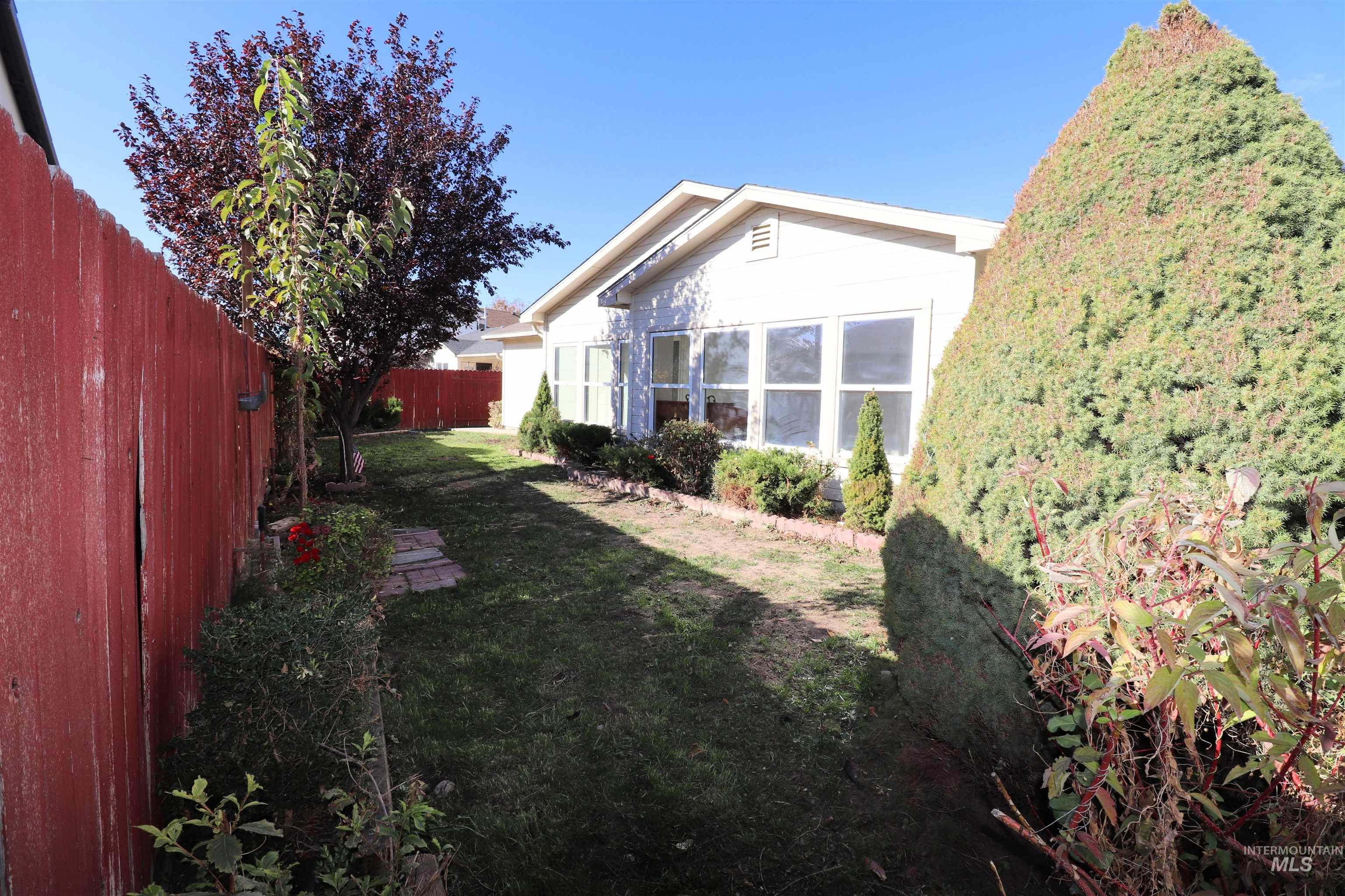 View of fenced backyard