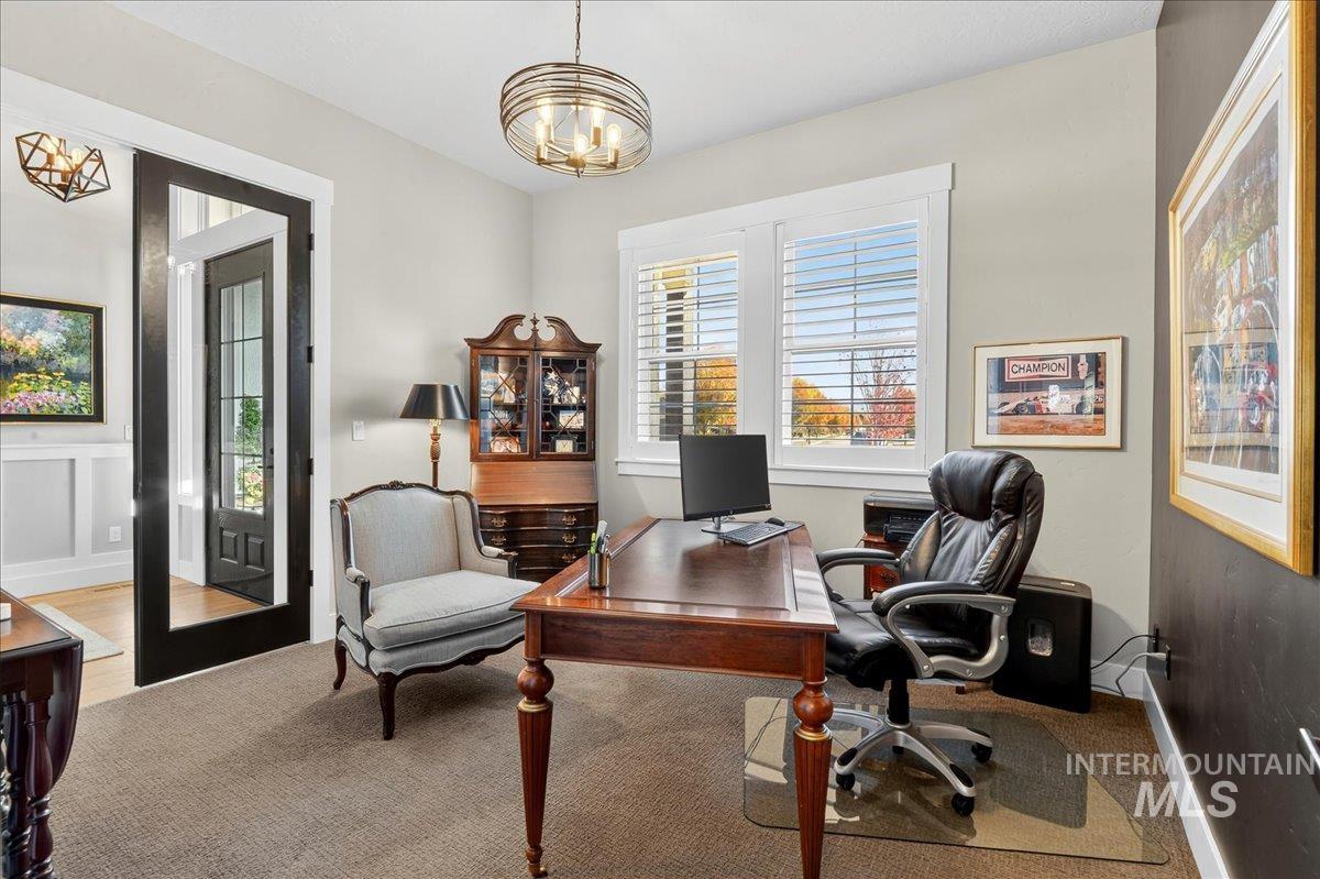 View of carpeted home office