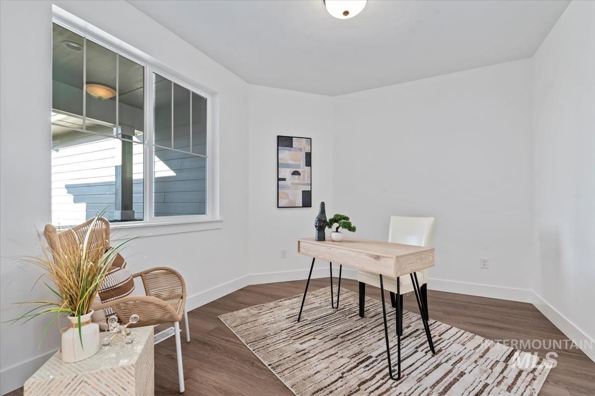 Office with dark wood finished floors