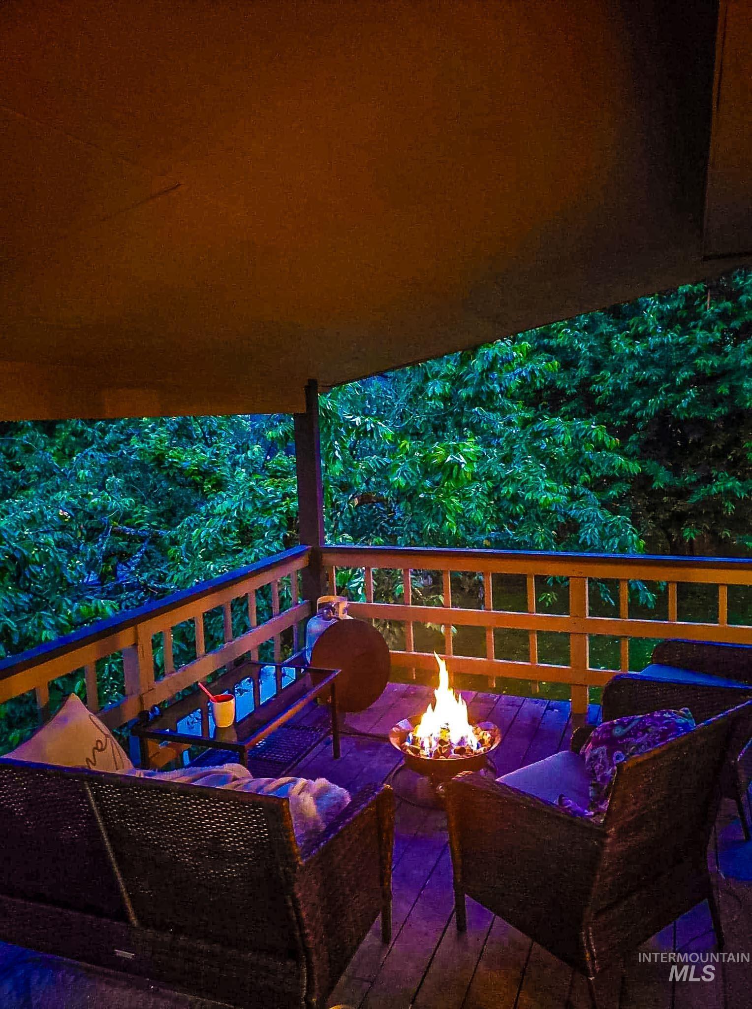 View of wooden balcony featuring a wooden deck