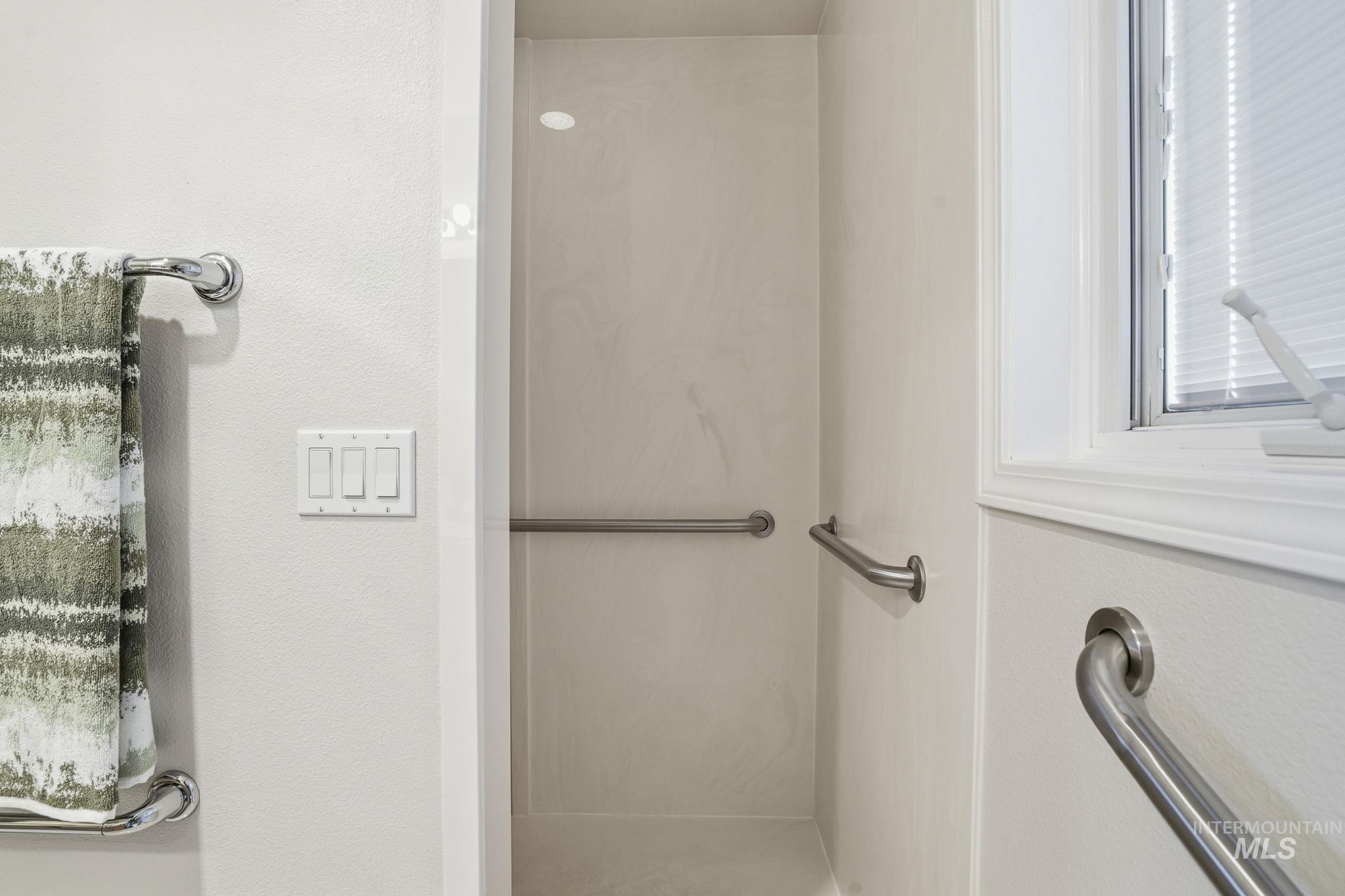 View of Primary bathroom walk-in shower.
