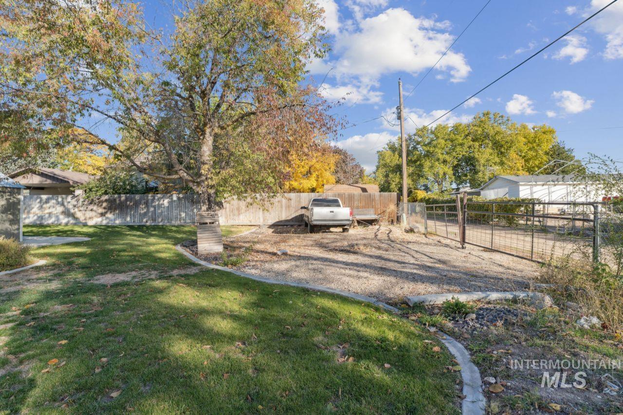 View of fenced backyard