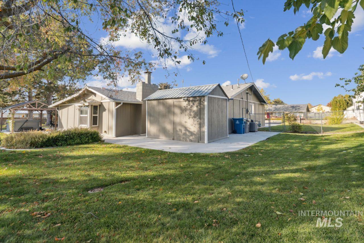 Rear view of house with a chimney