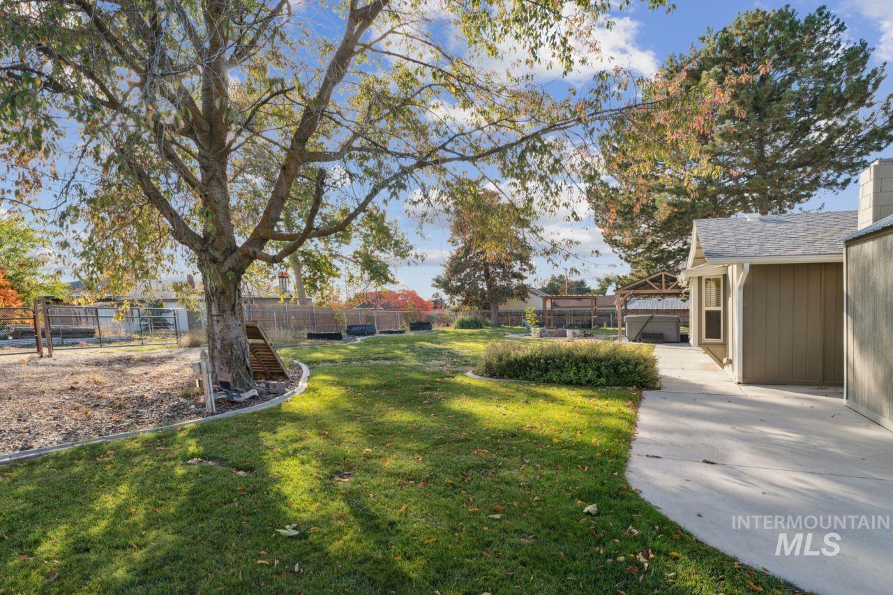 View of fenced backyard