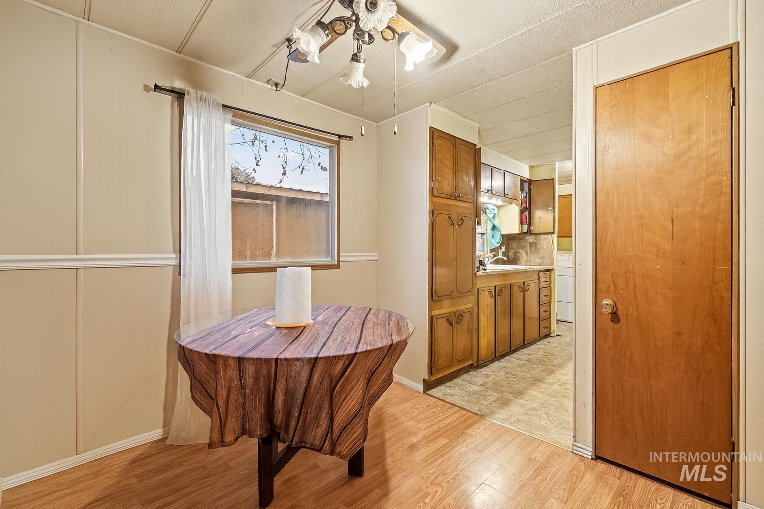 Dining room with light wood-style floors