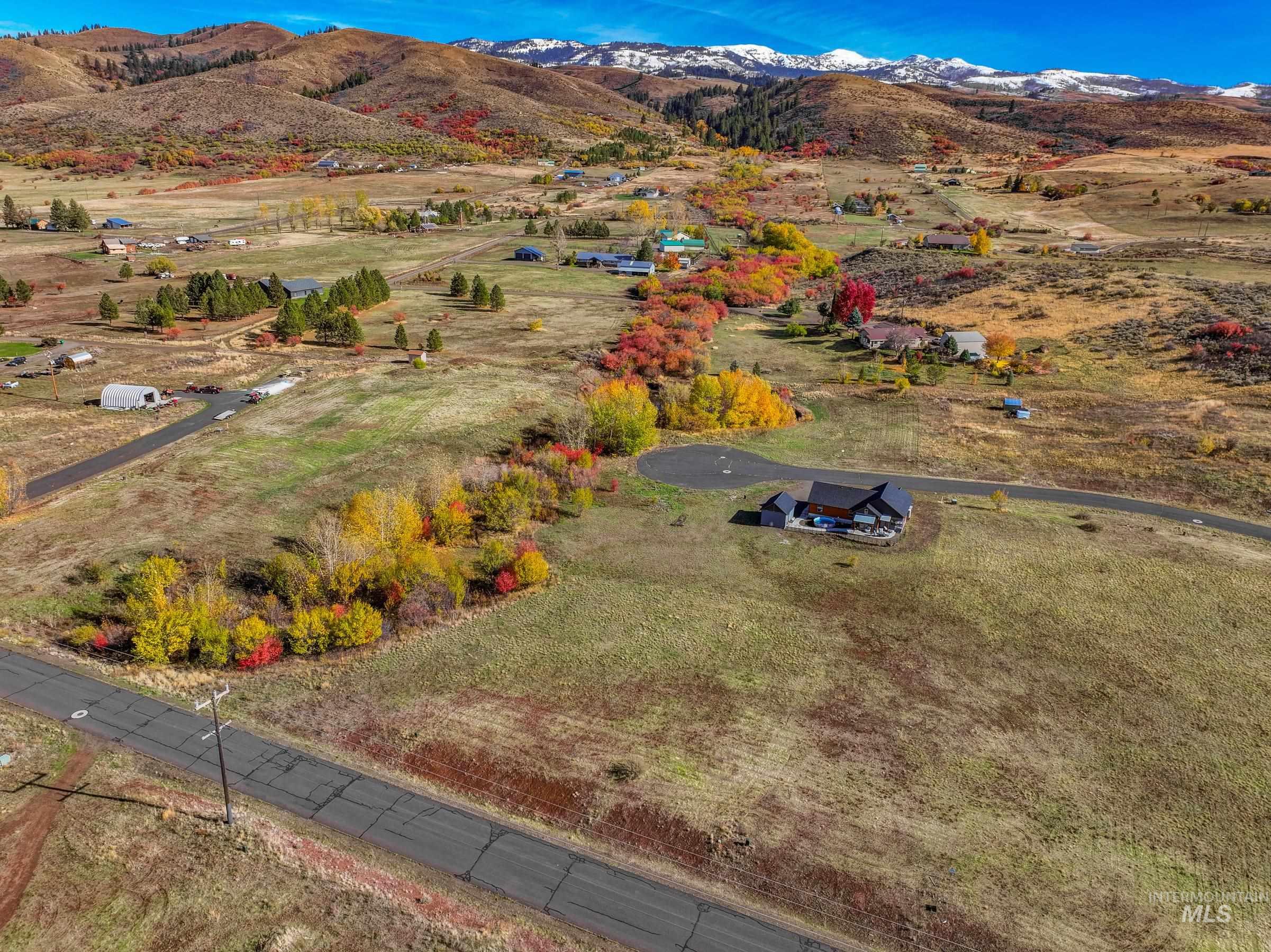 Overview of rural landscape with a mountain backdrop