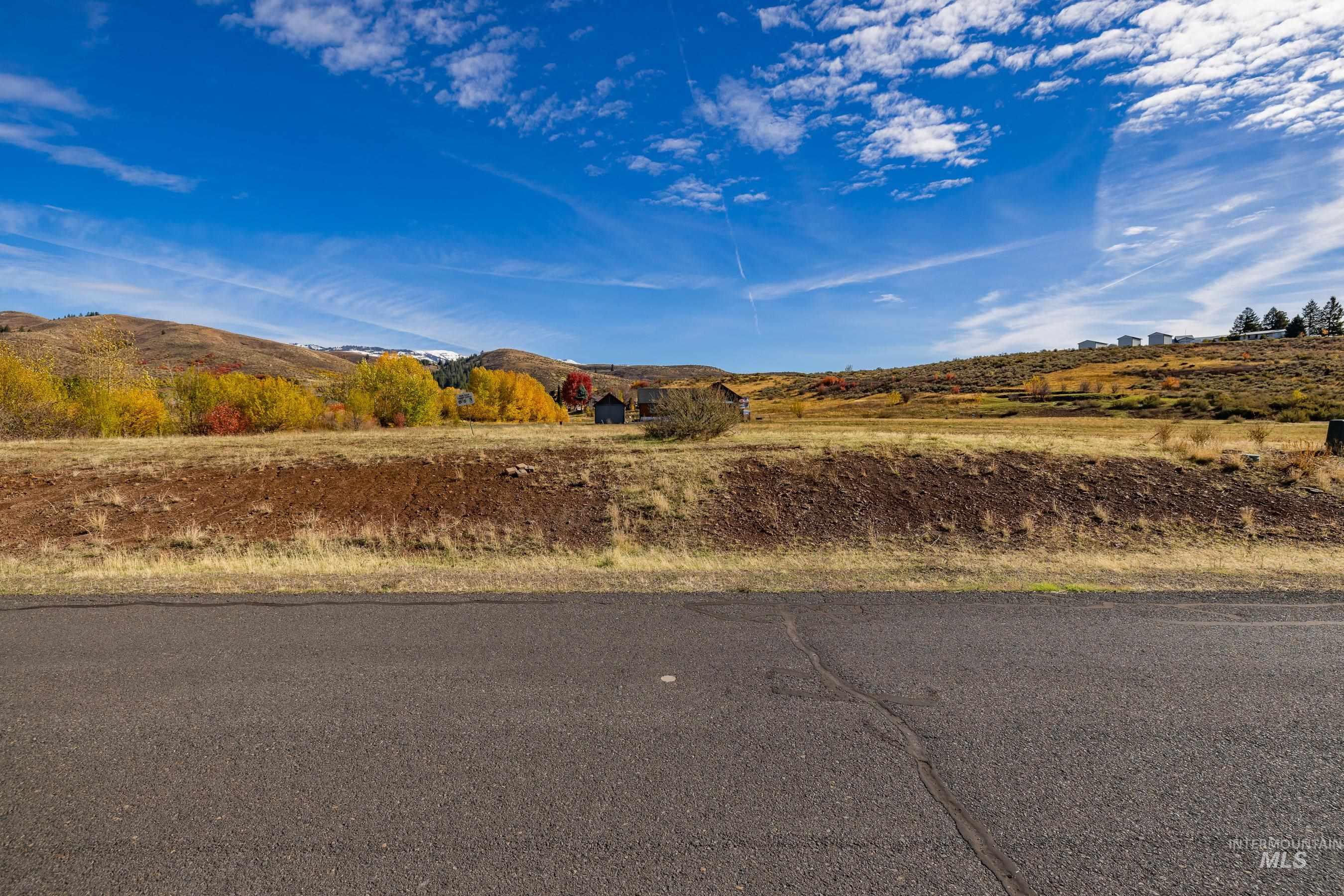 View of asphalt road with a mountain view