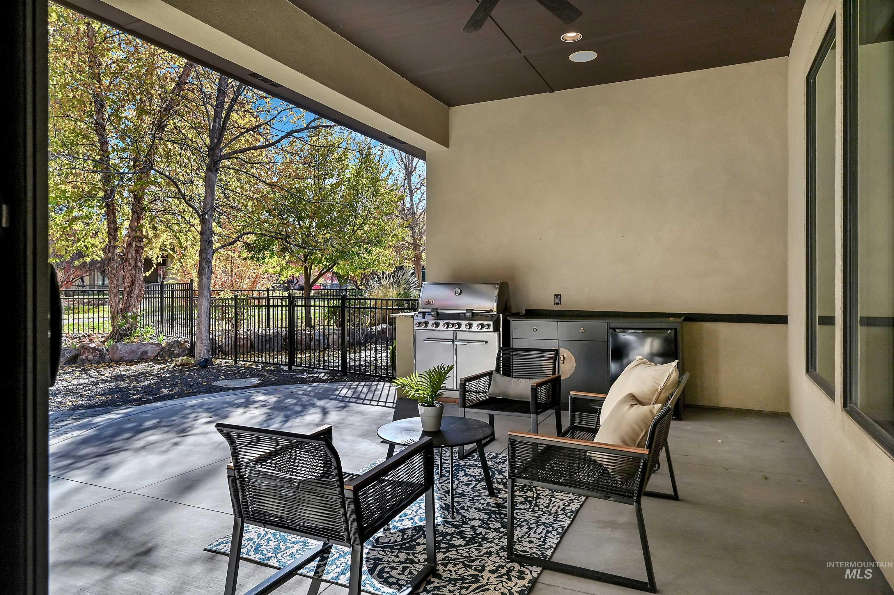 View of patio featuring ceiling fan and outdoor lounge area