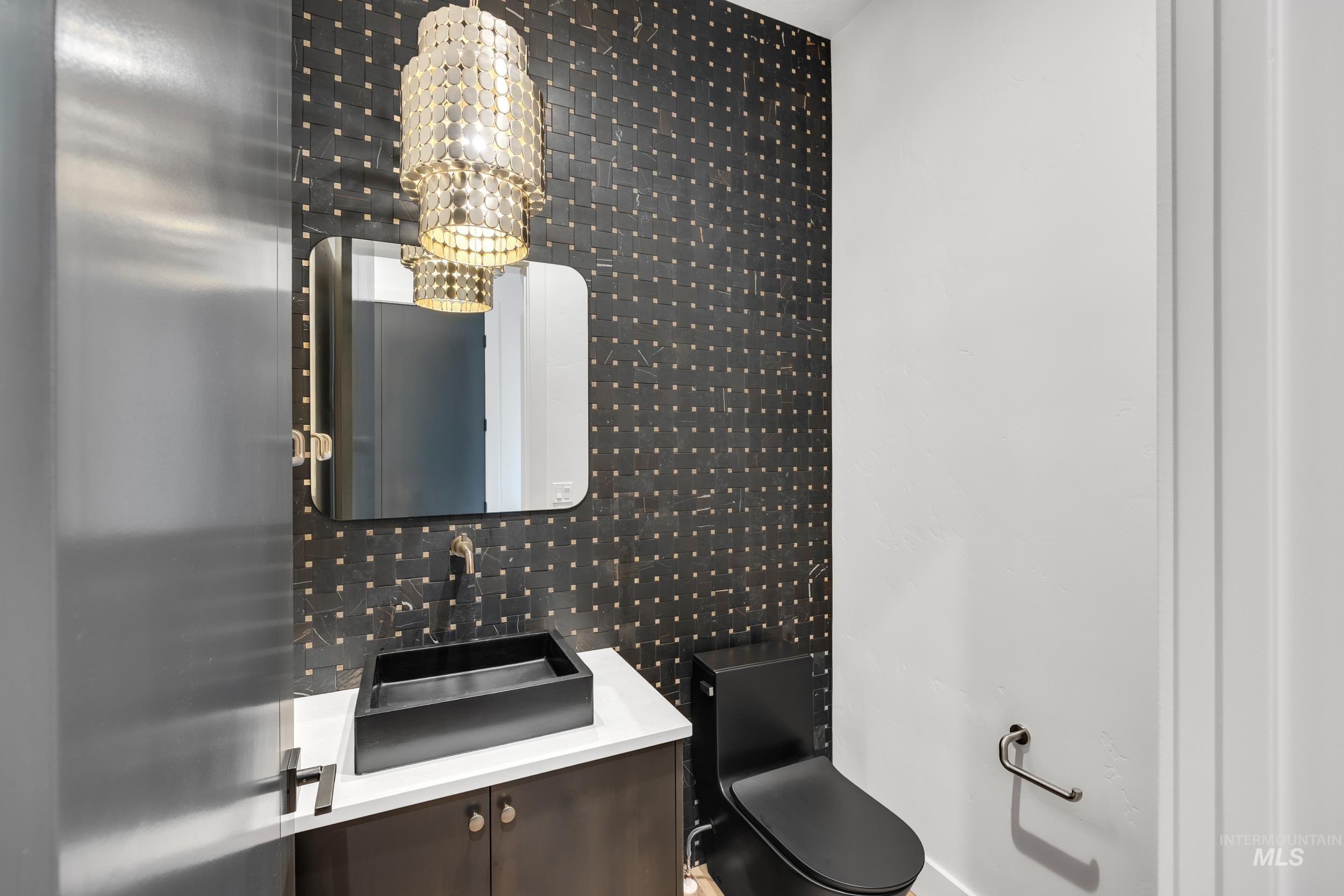 Bathroom with vanity and toilet