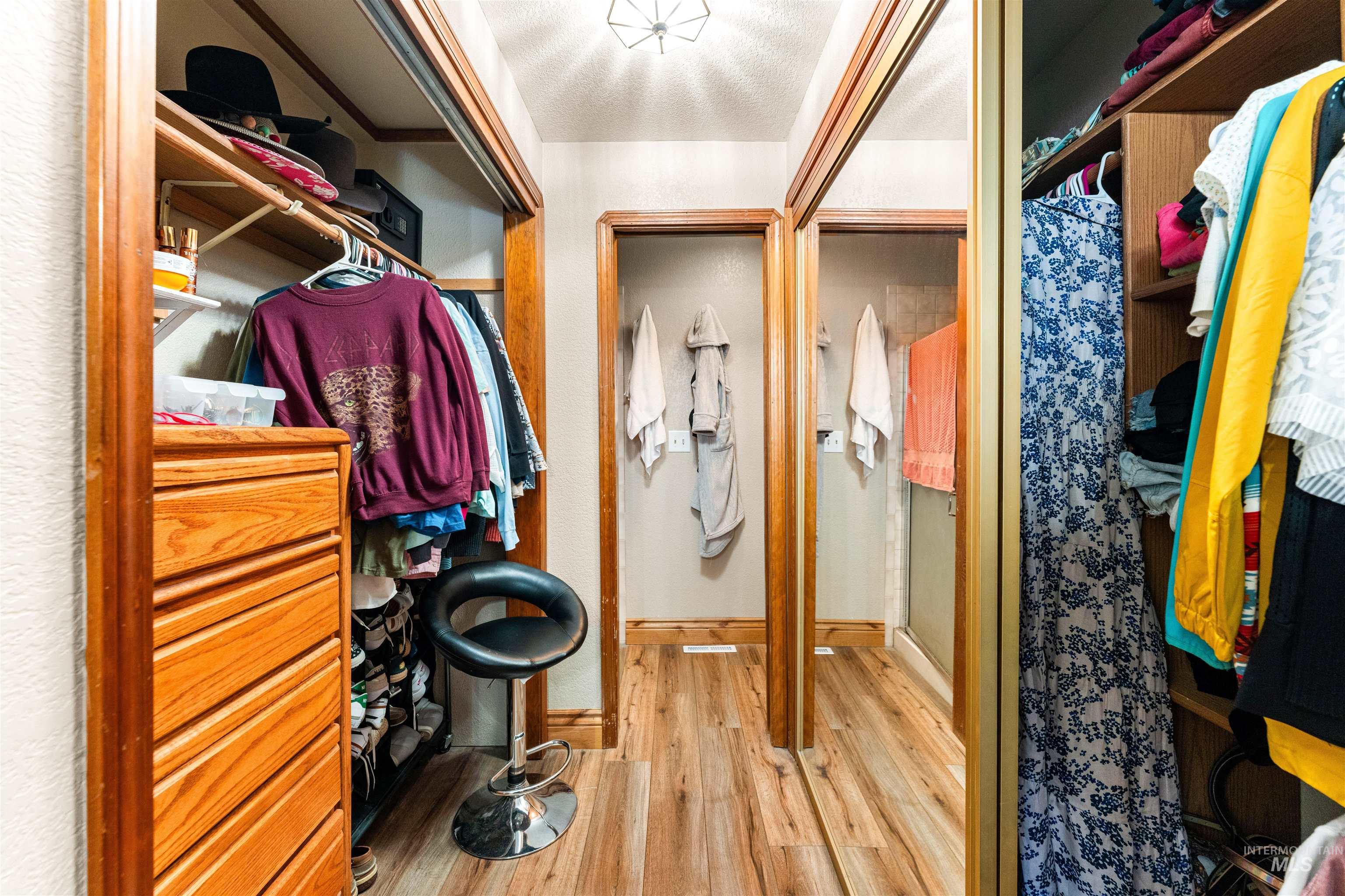 Spacious closet featuring light wood finished floors