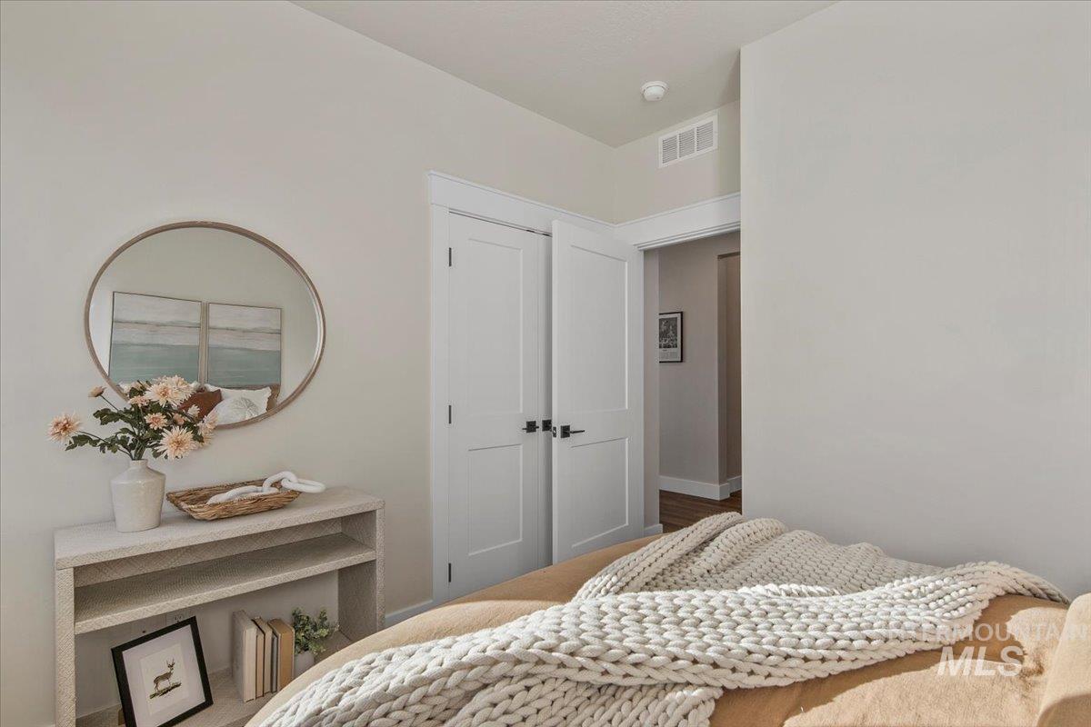 Bedroom featuring baseboards