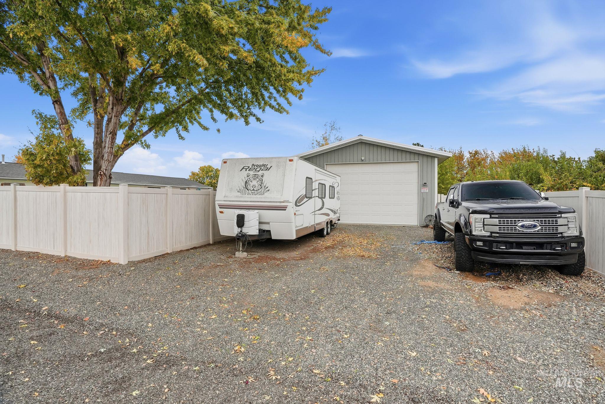 View of home's exterior featuring an outdoor structure