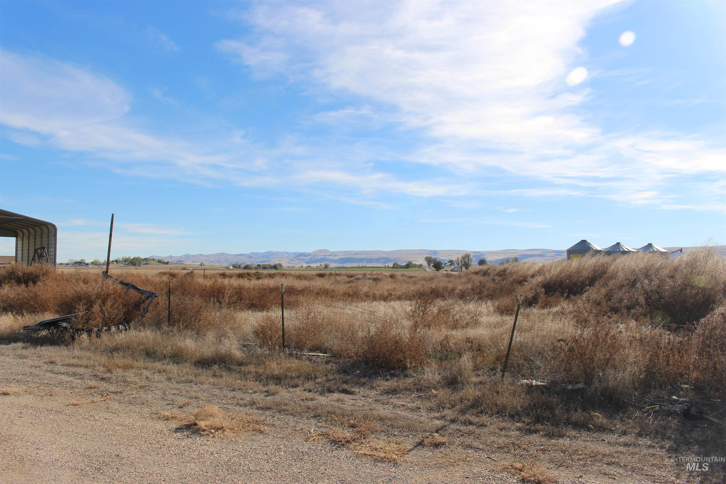 View of local wilderness with rural landscape and a mountainous background