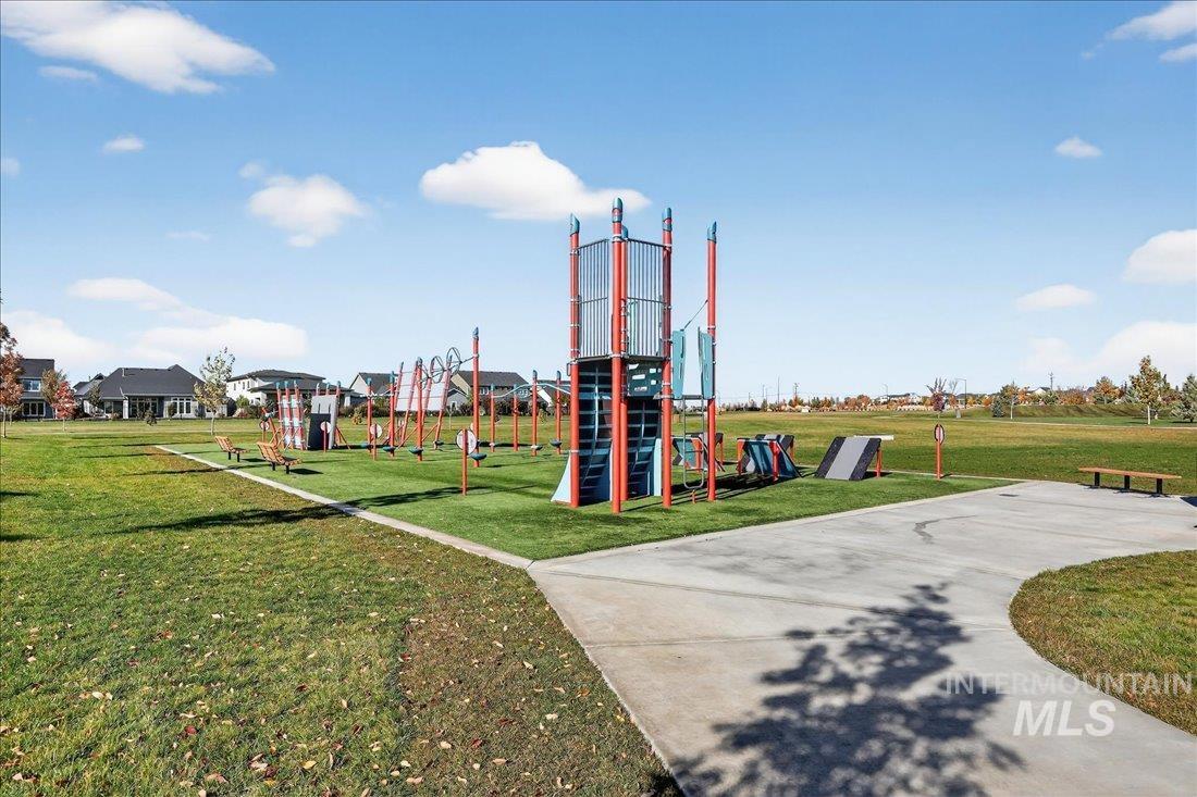 Communal playground featuring a lawn