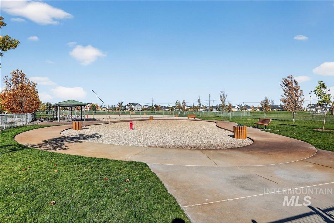 Surrounding community with a patio and a gazebo