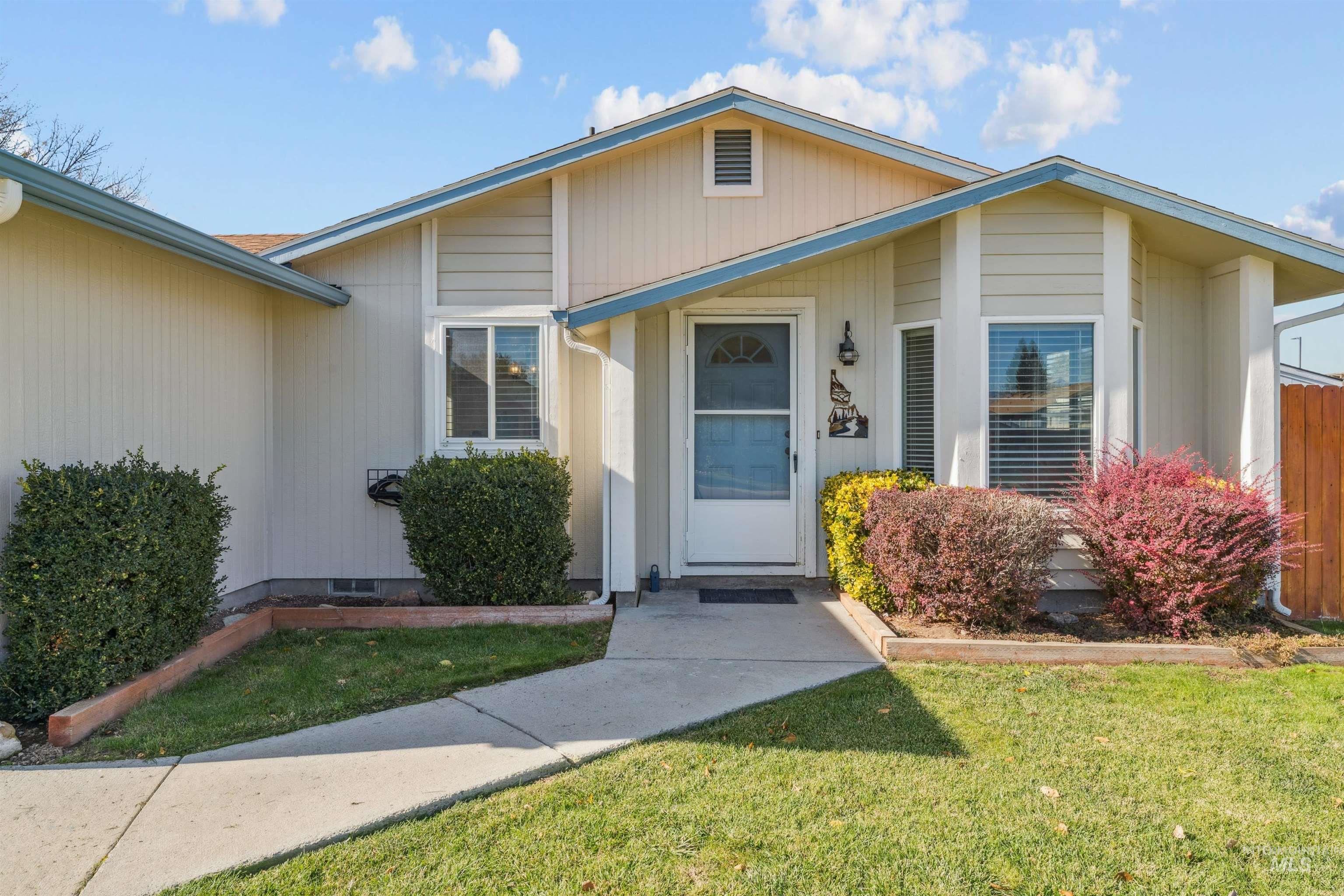 Property entrance with a lawn