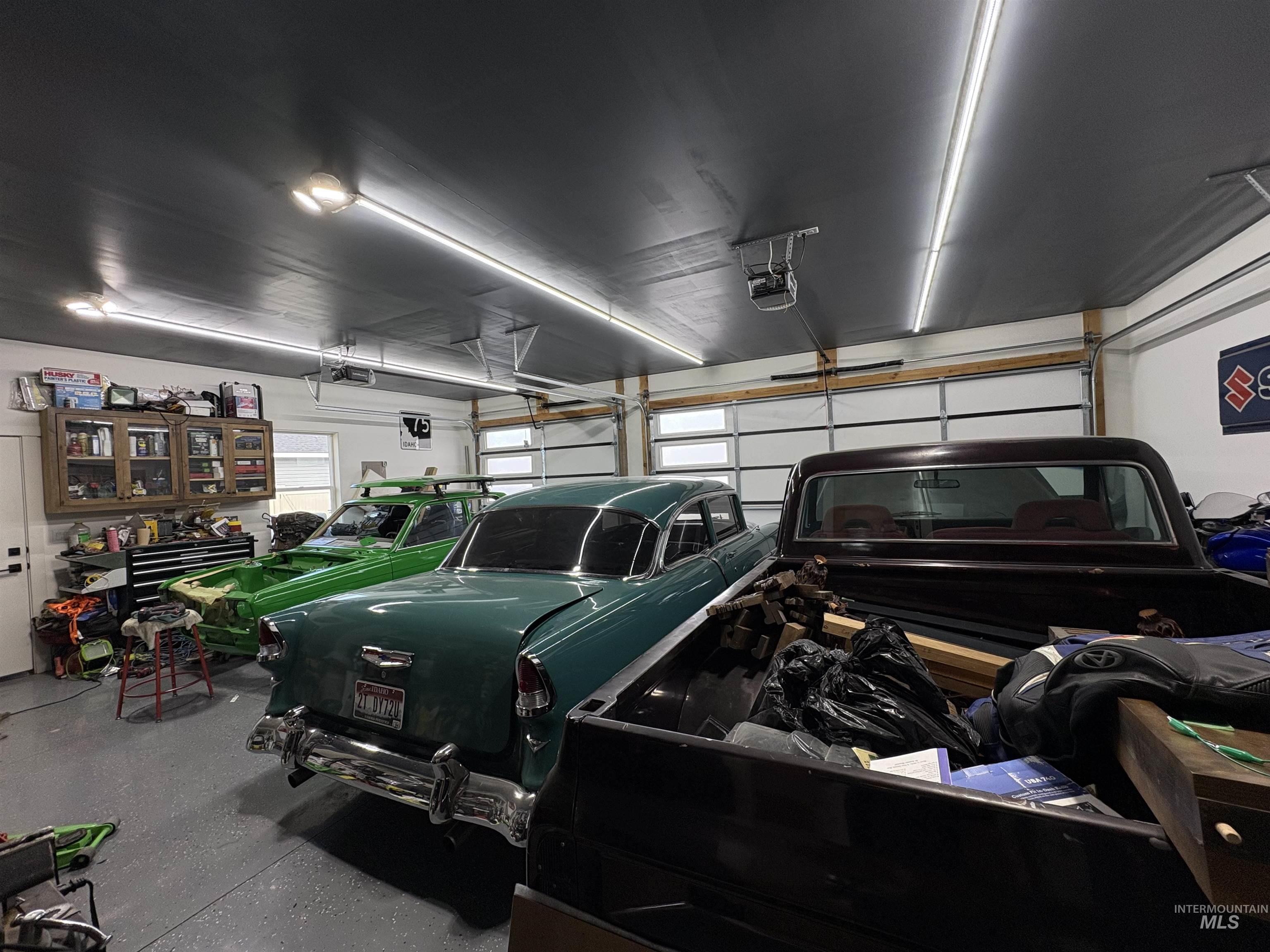 Garage featuring a garage door opener