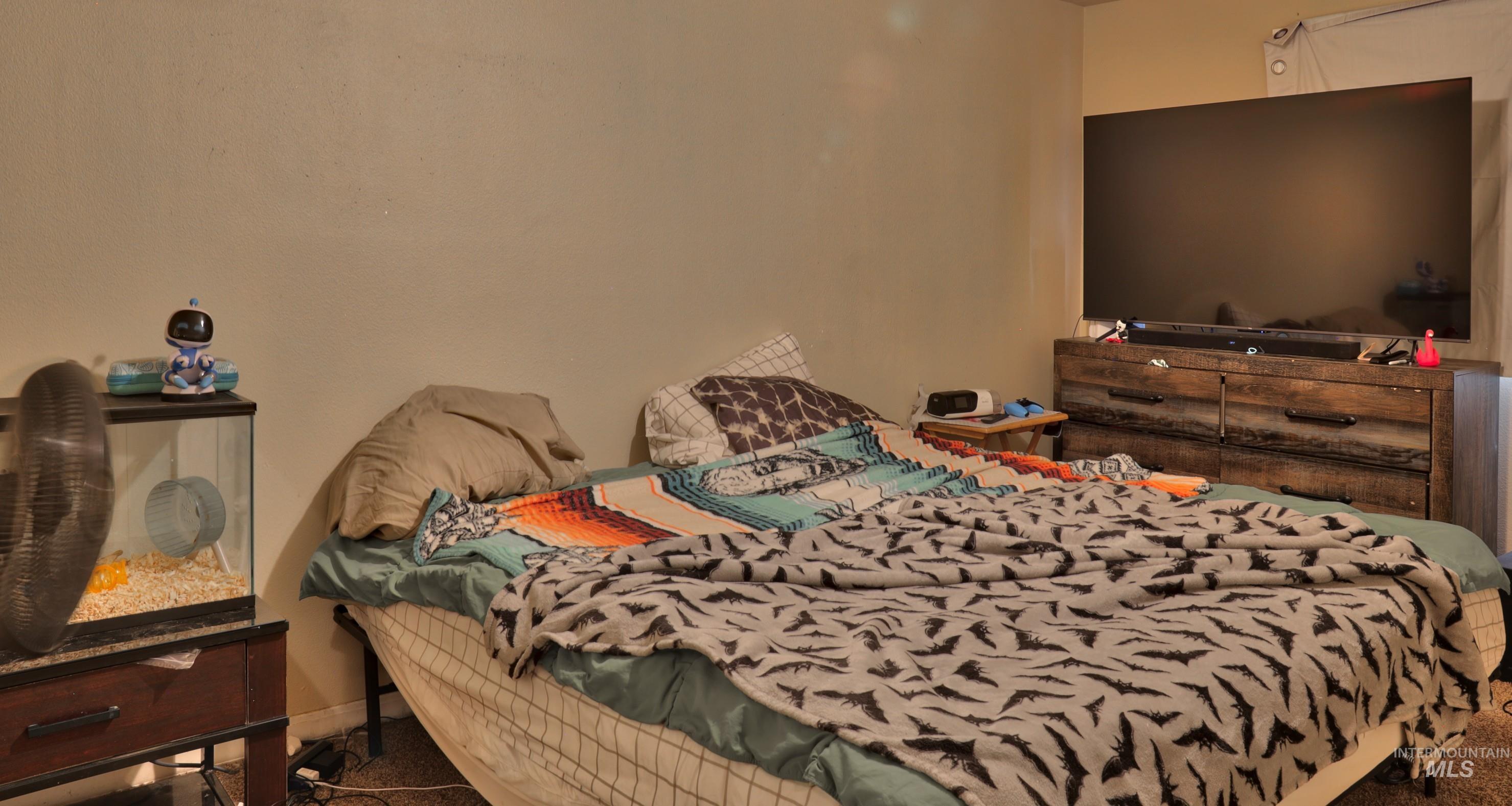 Bedroom with carpet flooring