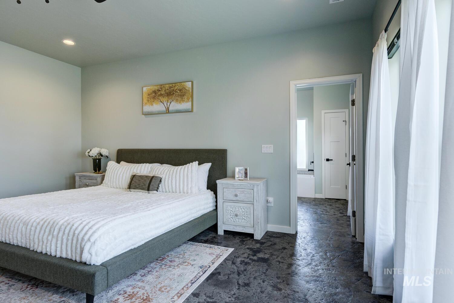 Bedroom featuring baseboards and recessed lighting