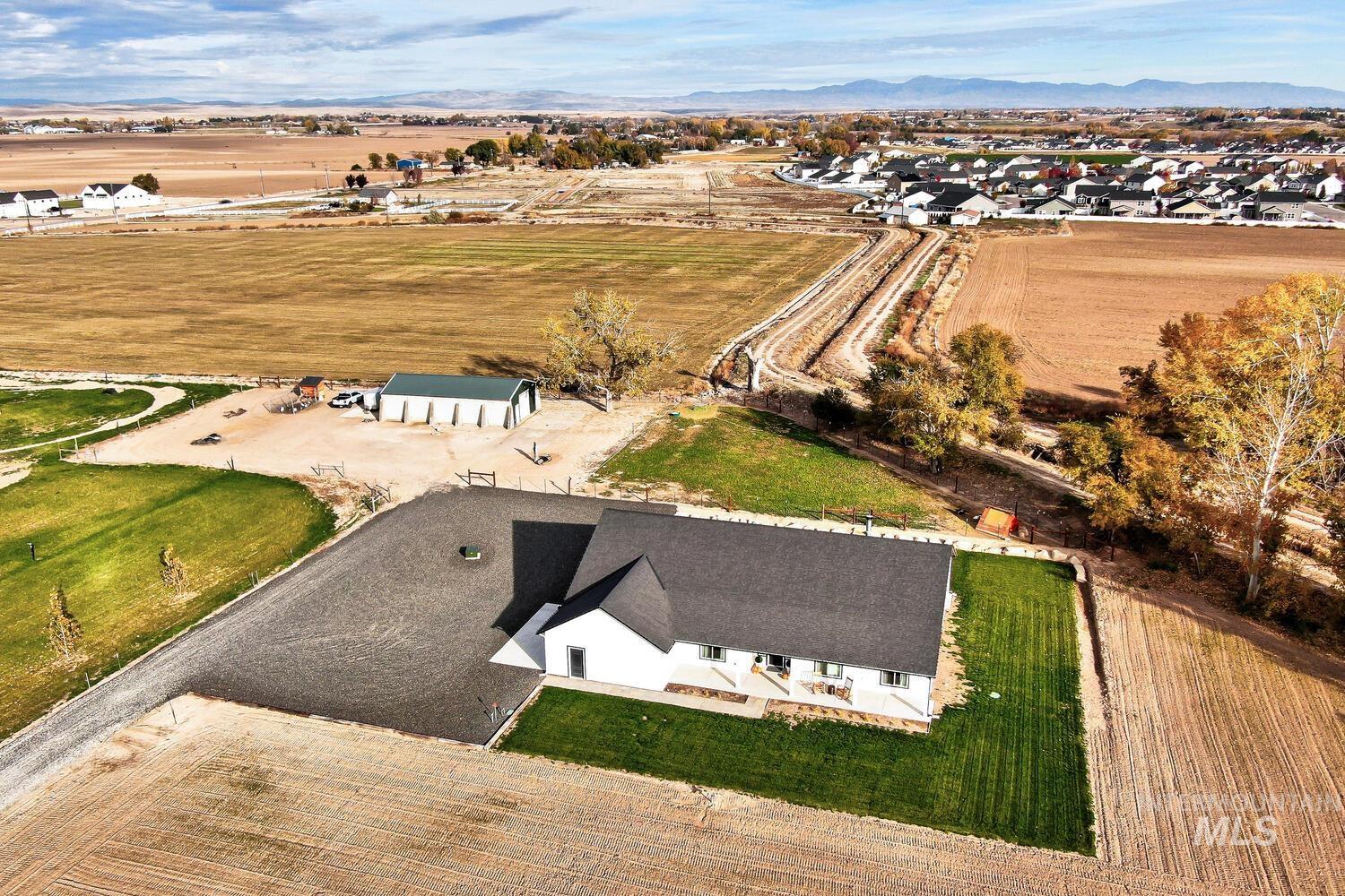 Aerial overview of property's location with rural landscape