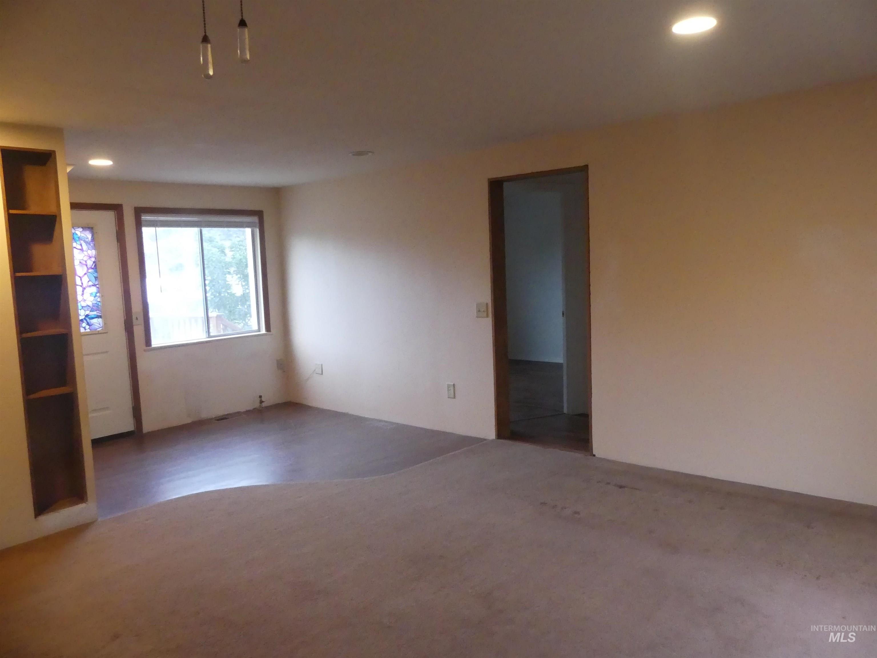 Unfurnished room featuring recessed lighting and carpet floors