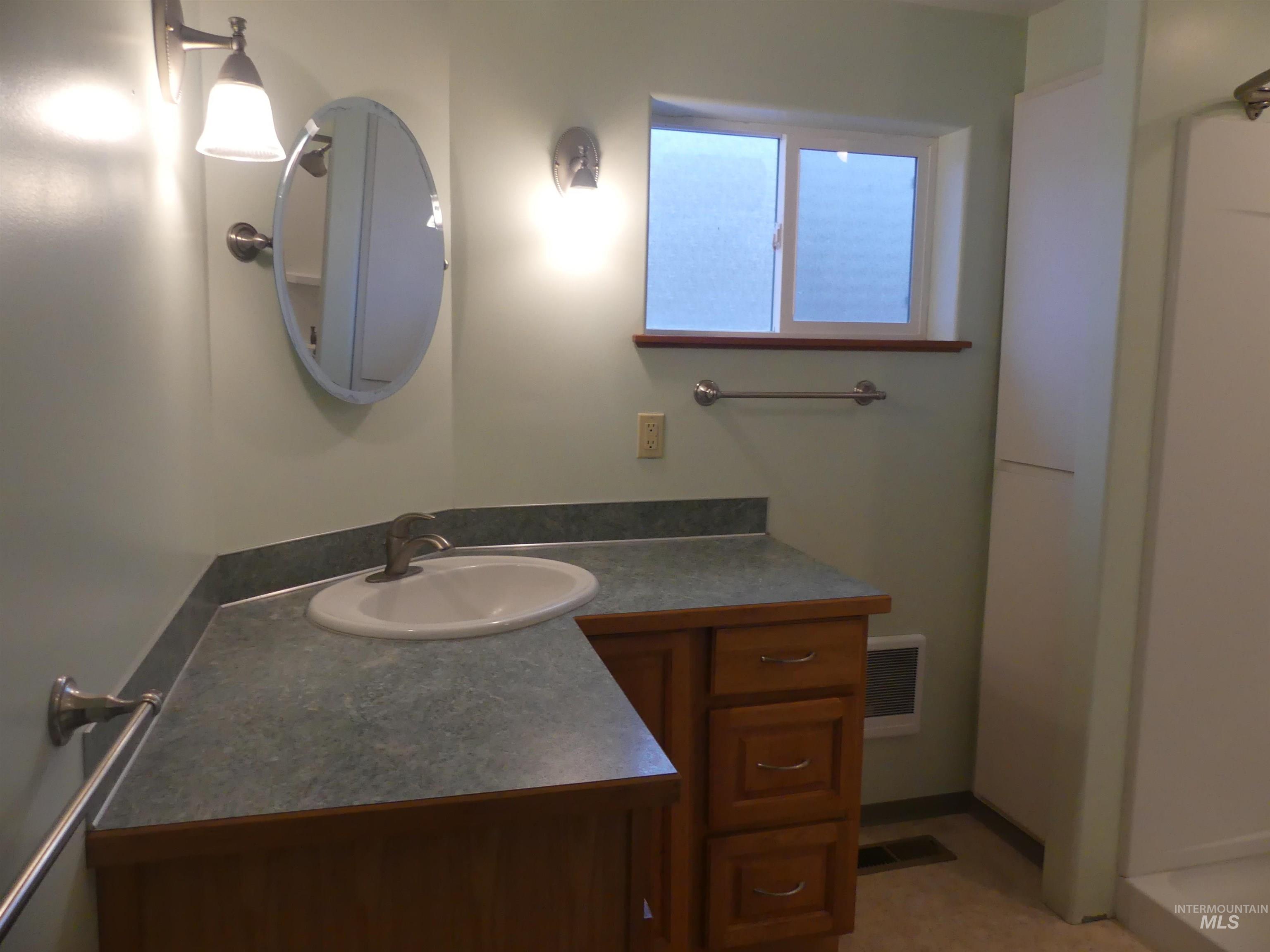 Bathroom featuring vanity