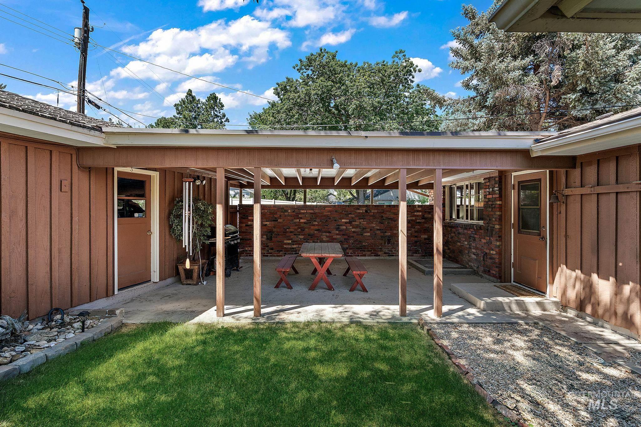 View of patio featuring area for grilling