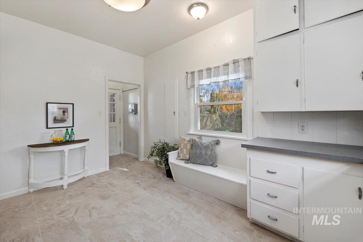 Sitting area featuring baseboards
