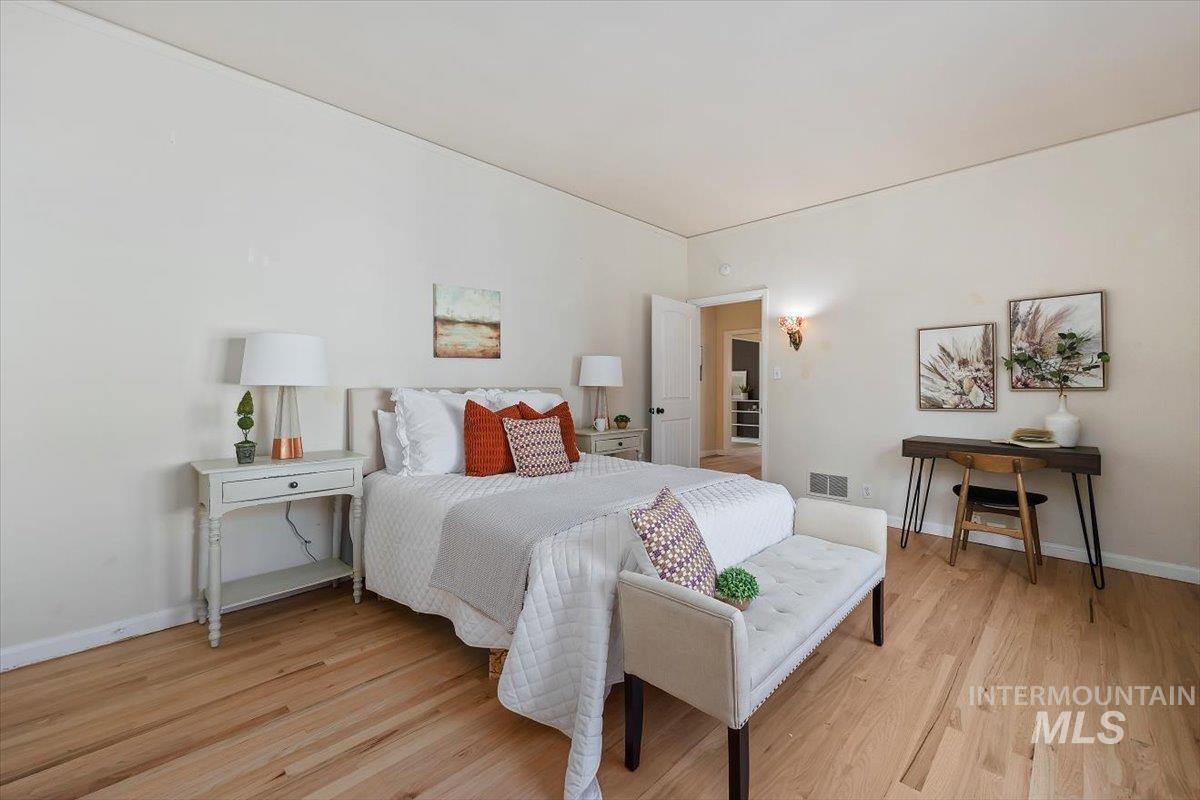 Bedroom with light wood-type flooring