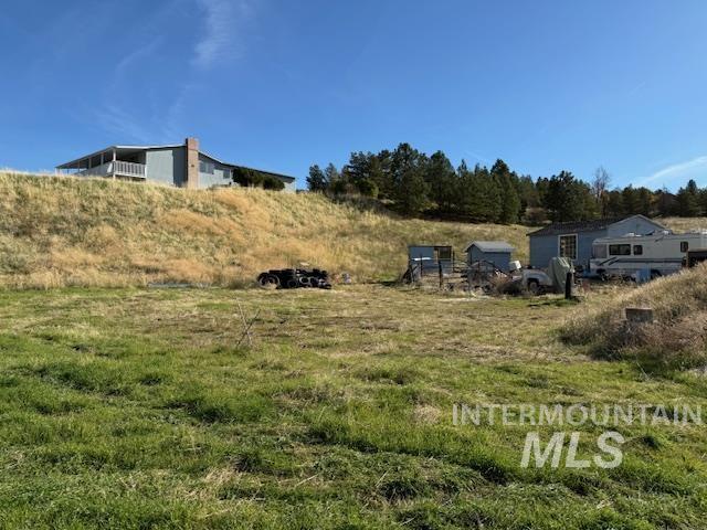 View of yard with a view of countryside