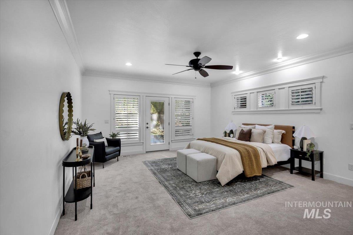 Bedroom with access to outside, crown molding, a ceiling fan, light colored carpet, and recessed lighting