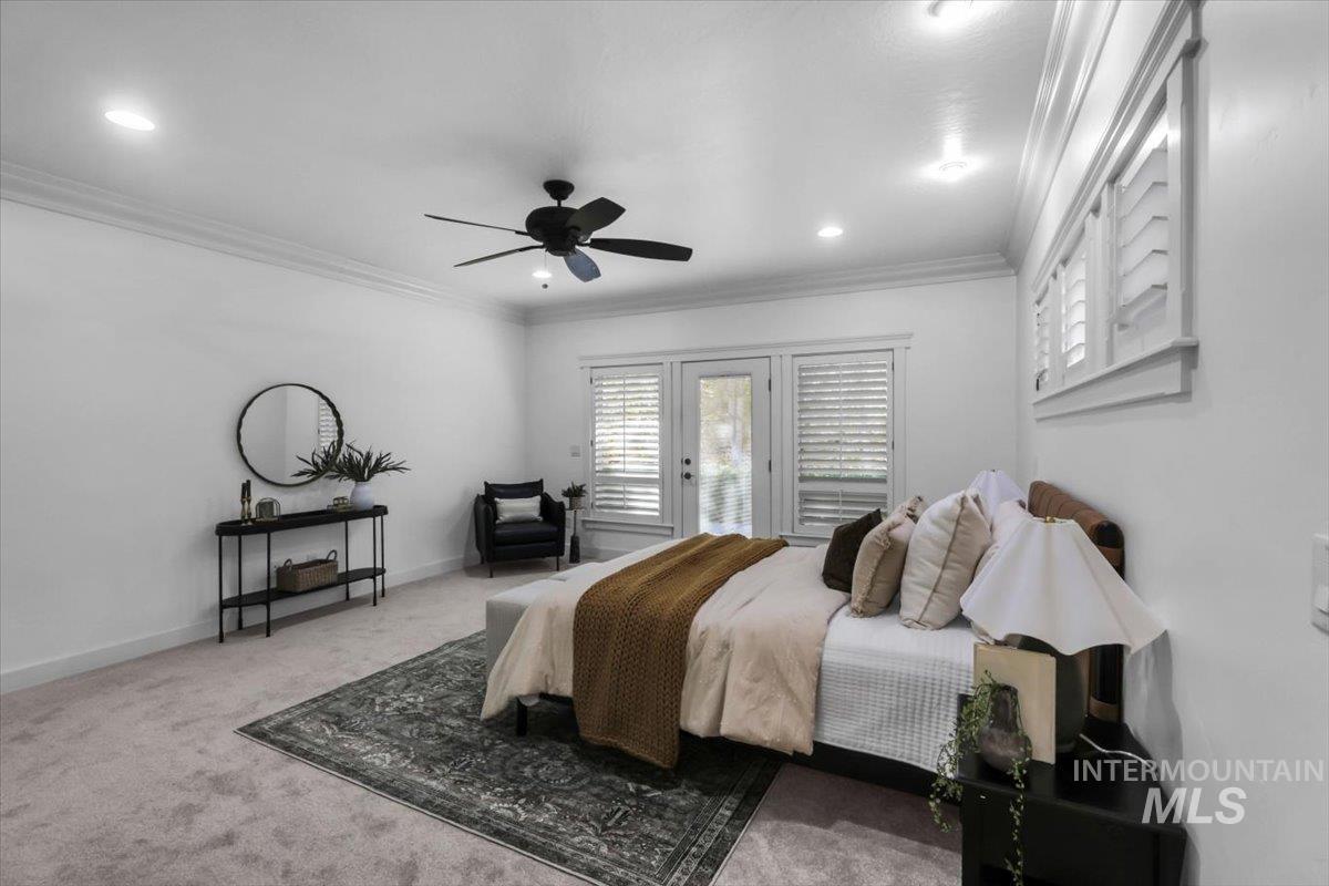 Carpeted bedroom with ornamental molding, ceiling fan, access to outside, and recessed lighting